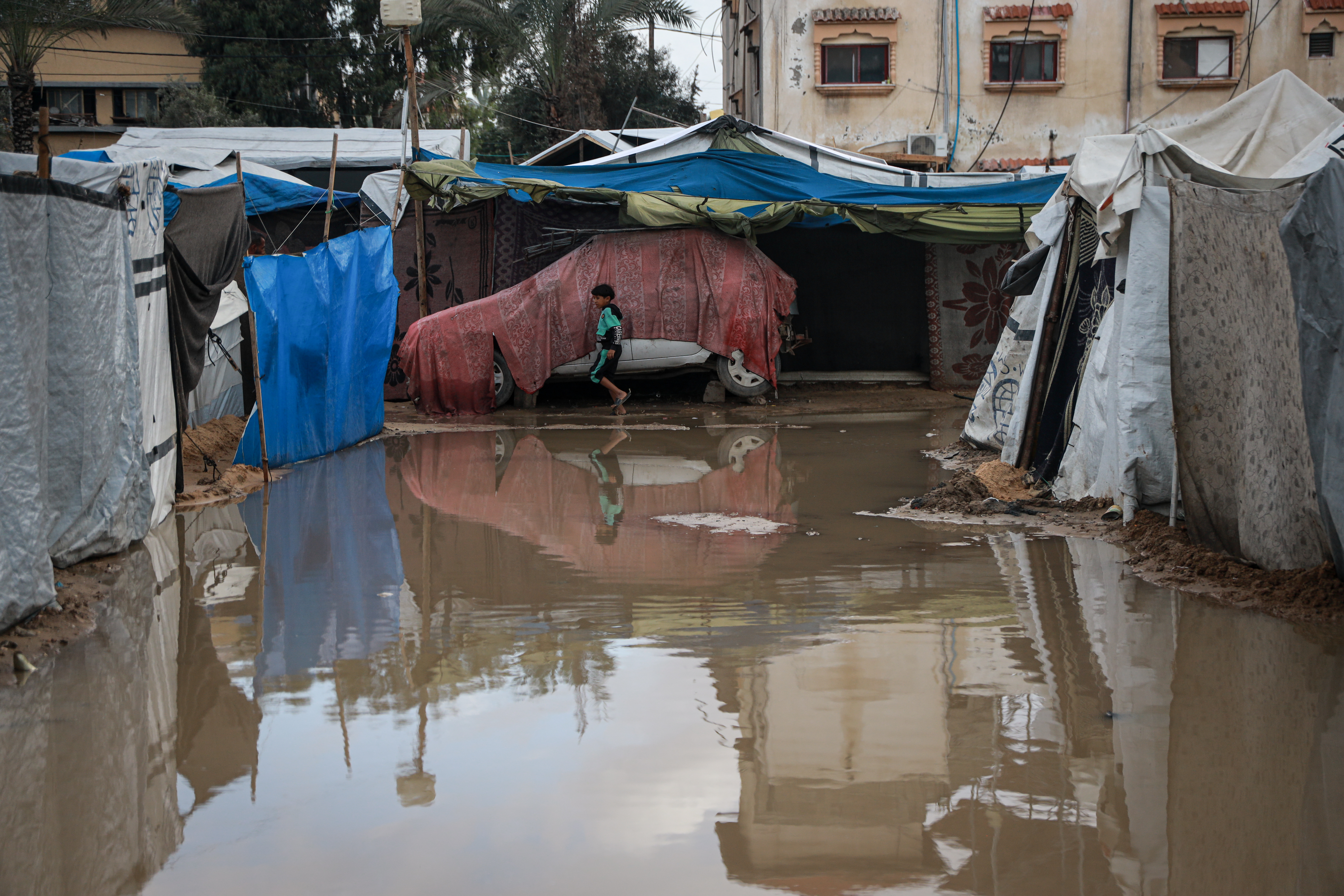 Winter rains have flooded tents in Gaza, with more rain expected over the next few months