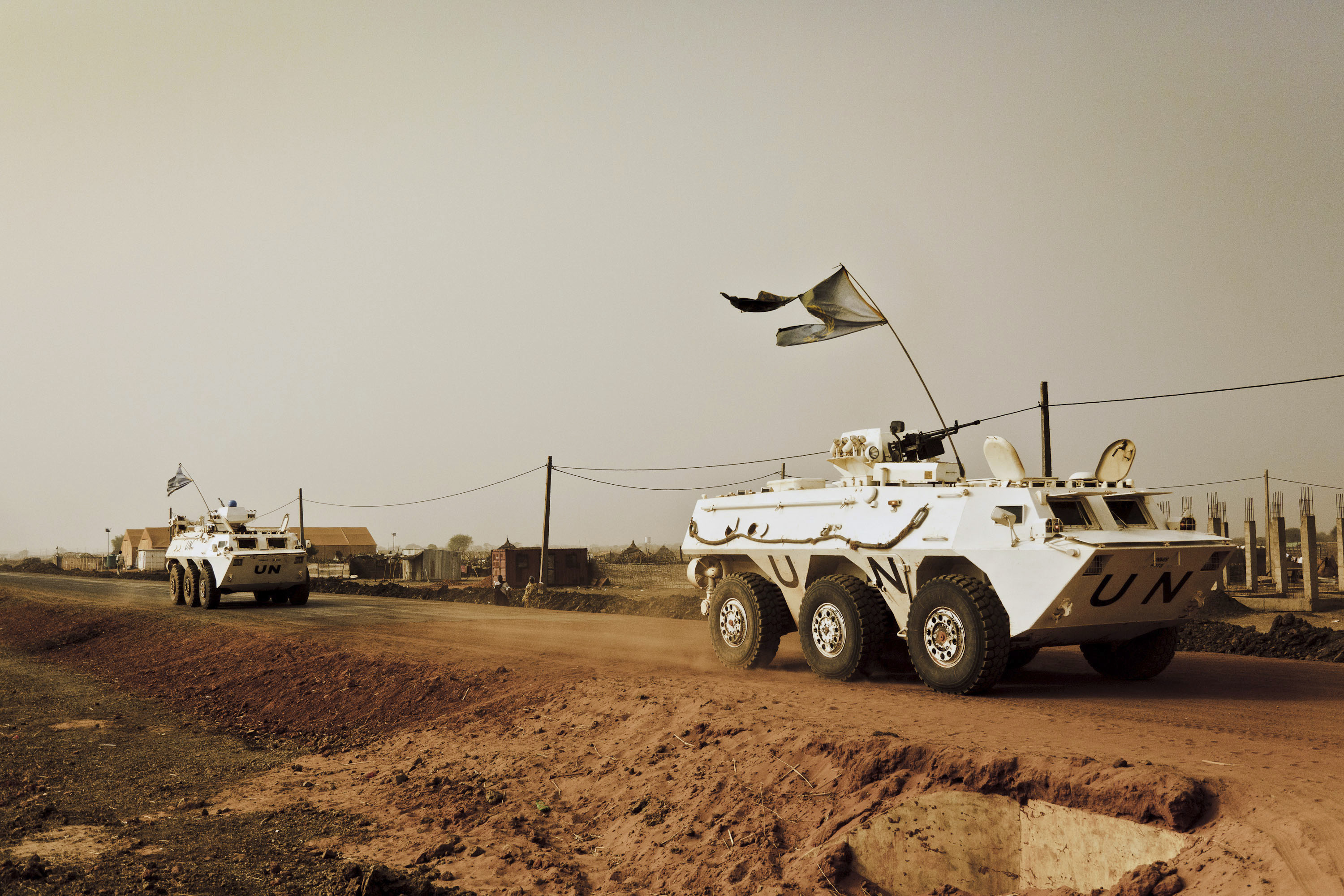 A UNMIS peacekeeper patrol in Abyei, Southern Sudan, Friday, March 11, 2011.Scores of villagers have died in recent fighting in Southern Sudan despite the presence of 10,000 U.N. troops mandated with protecting civilians. Now, internal documents say U.N. officials have ordered the peacekeepers not to operate in an area where civilians are at risk in upcoming battles, after being asked to avoid the region by the south's military.(AP Photo/Tim Freccia)