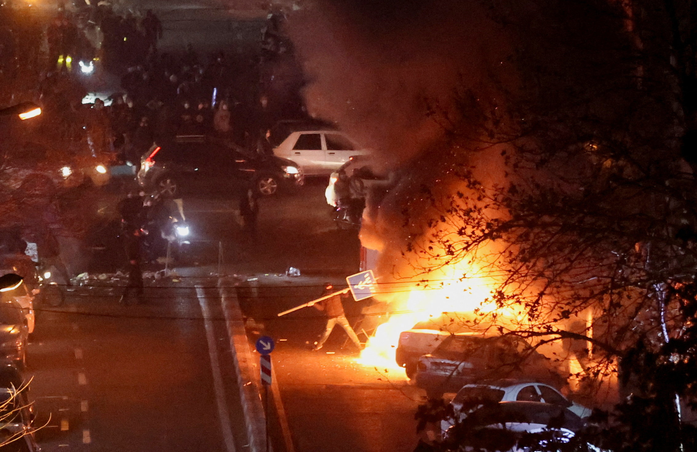 Iranian demonstrators gather in a street during a protest over the collapse of the currency's value, in Tehran, Iran, January 8, 2026. Stringer/WANA (West Asia News Agency) via REUTERS ATTENTION EDITORS - THIS PICTURE WAS PROVIDED BY A THIRD PARTY