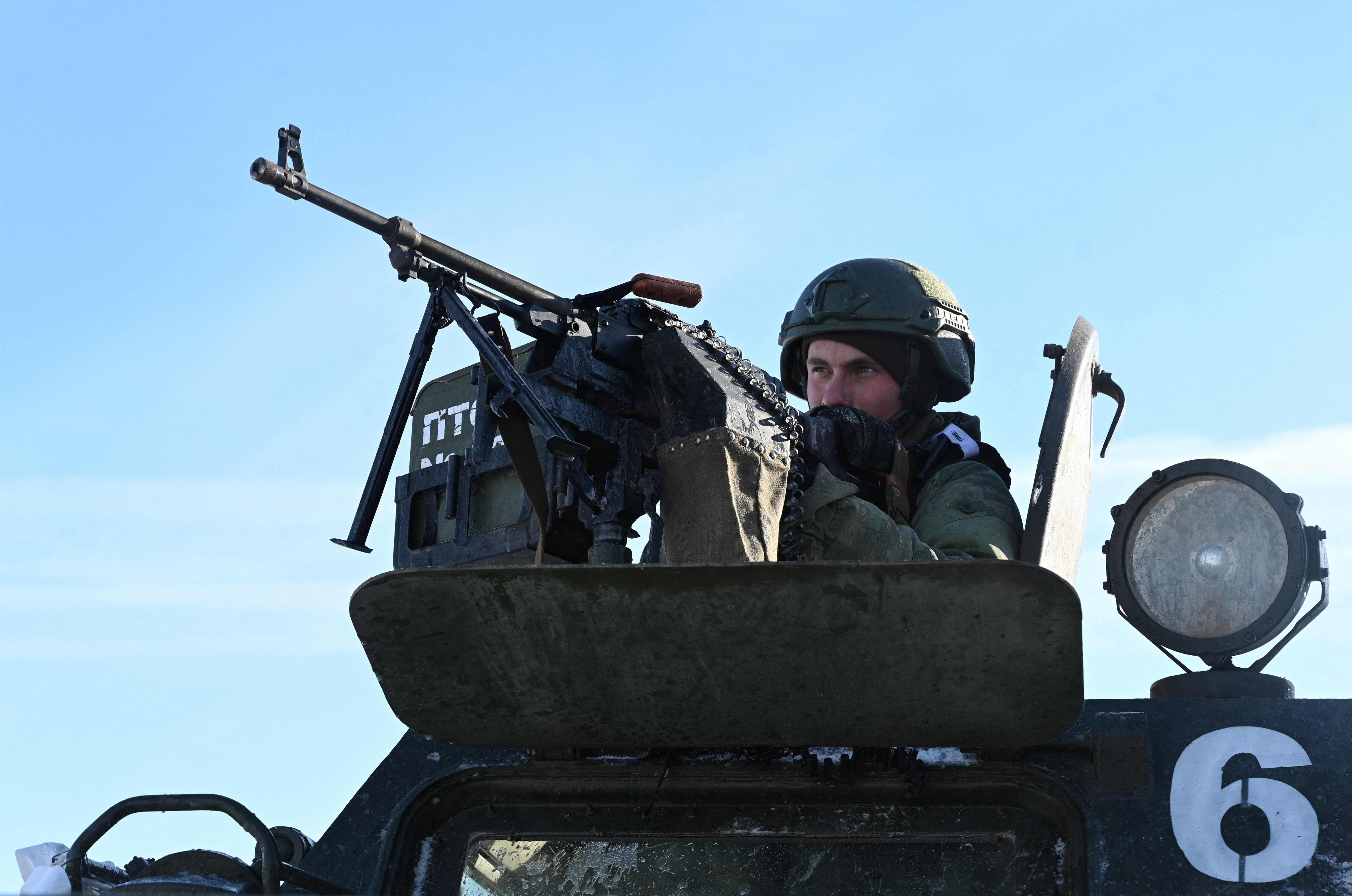 A Russian service member of a separate engineering unit of the Southern Military District aims a weapon while undergoing an intensive combat training course to improve skills in setting up barriers, clearing terrain of mines and crossing water obstacles, amid the Russia-Ukraine conflict at a firing range in the Rostov region, Russia, January 19, 2026. REUTERS/Sergey Pivovarov