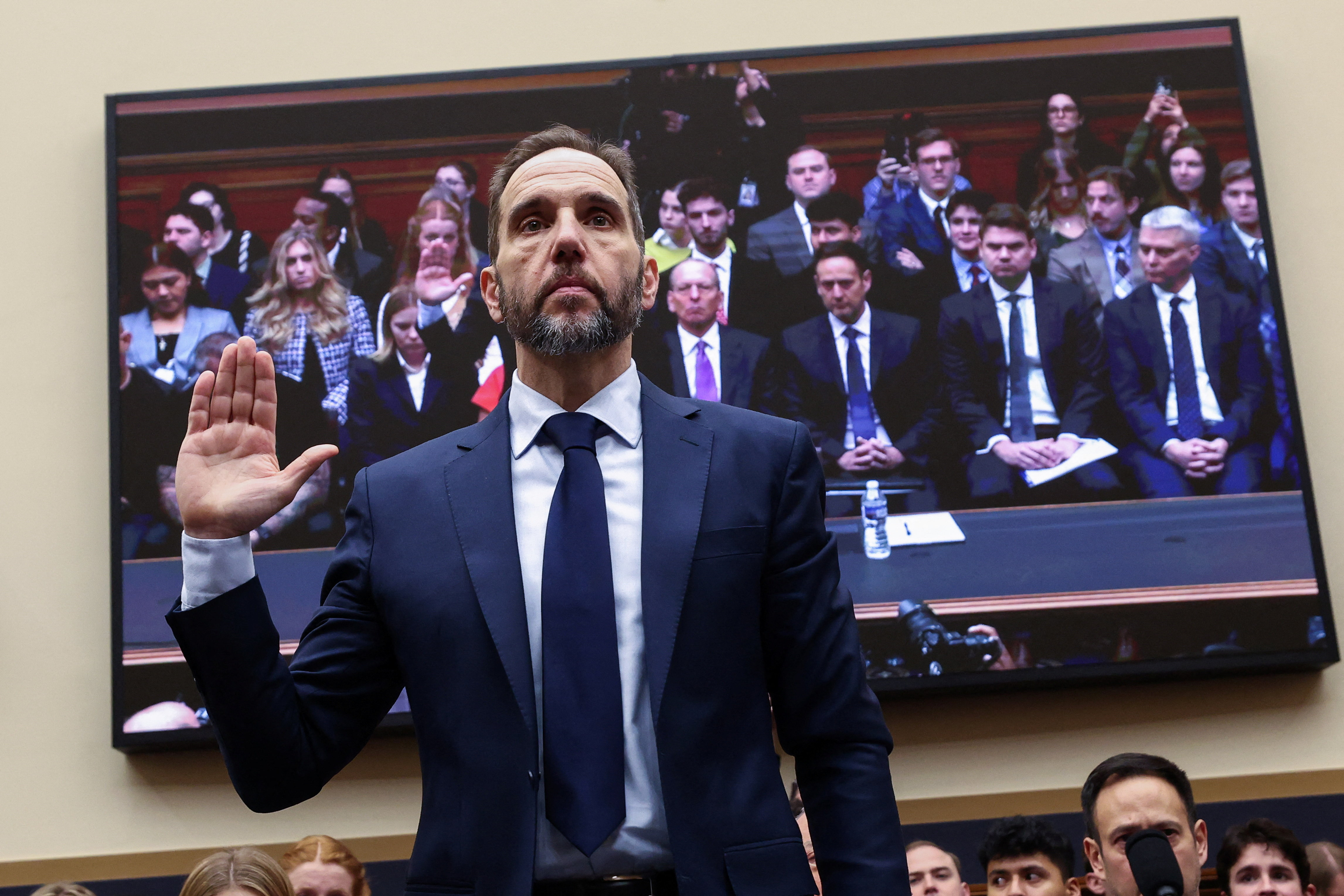 Former Special Counsel Jack Smith raises his hand to be sworn in on January 22