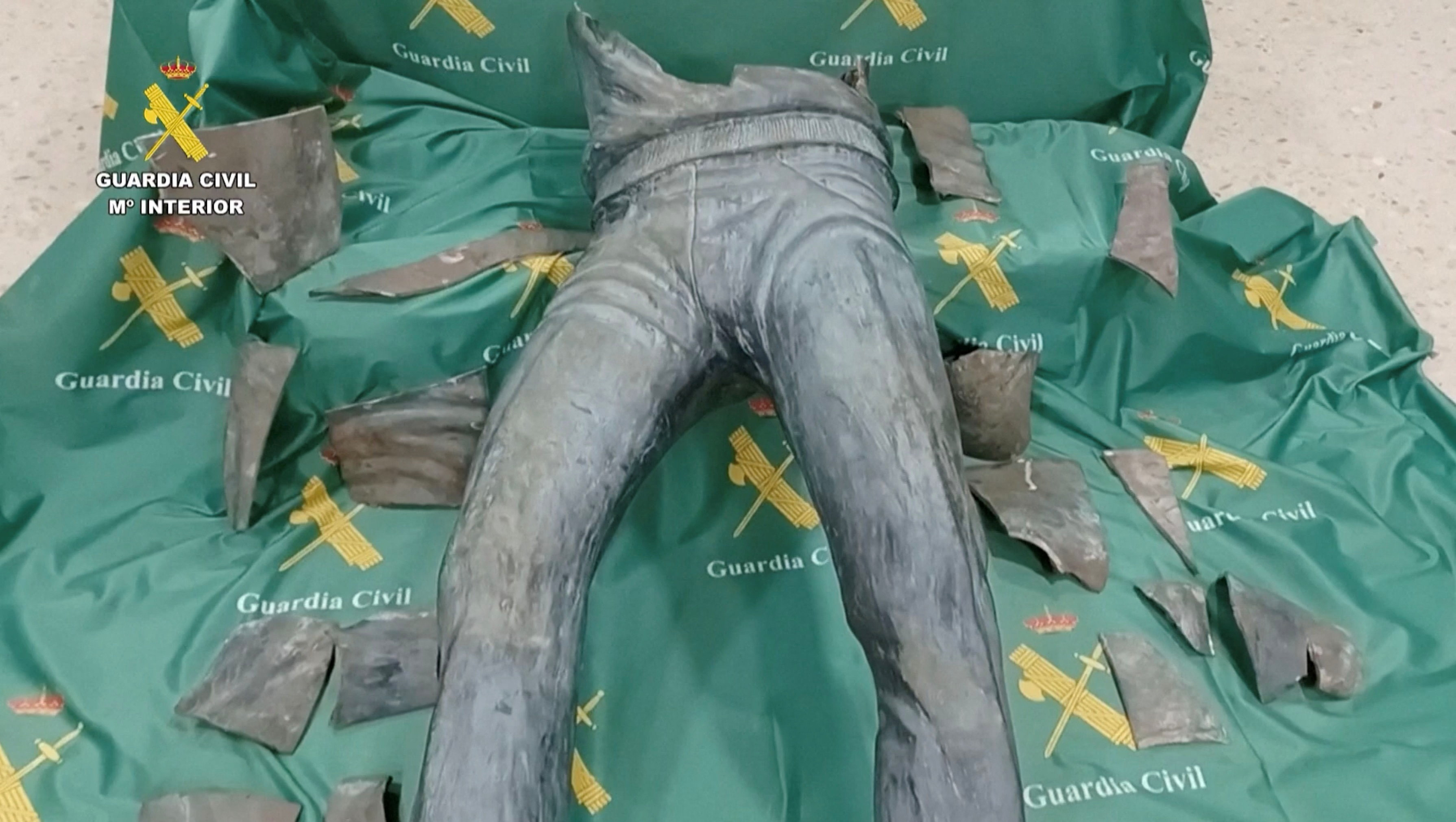 A screengrab from a handout video shows pieces of a statue of Seve Ballesteros, a late Spanish professional golfer, recovered by members of the Spanish law enforcement, in Santander, Spain