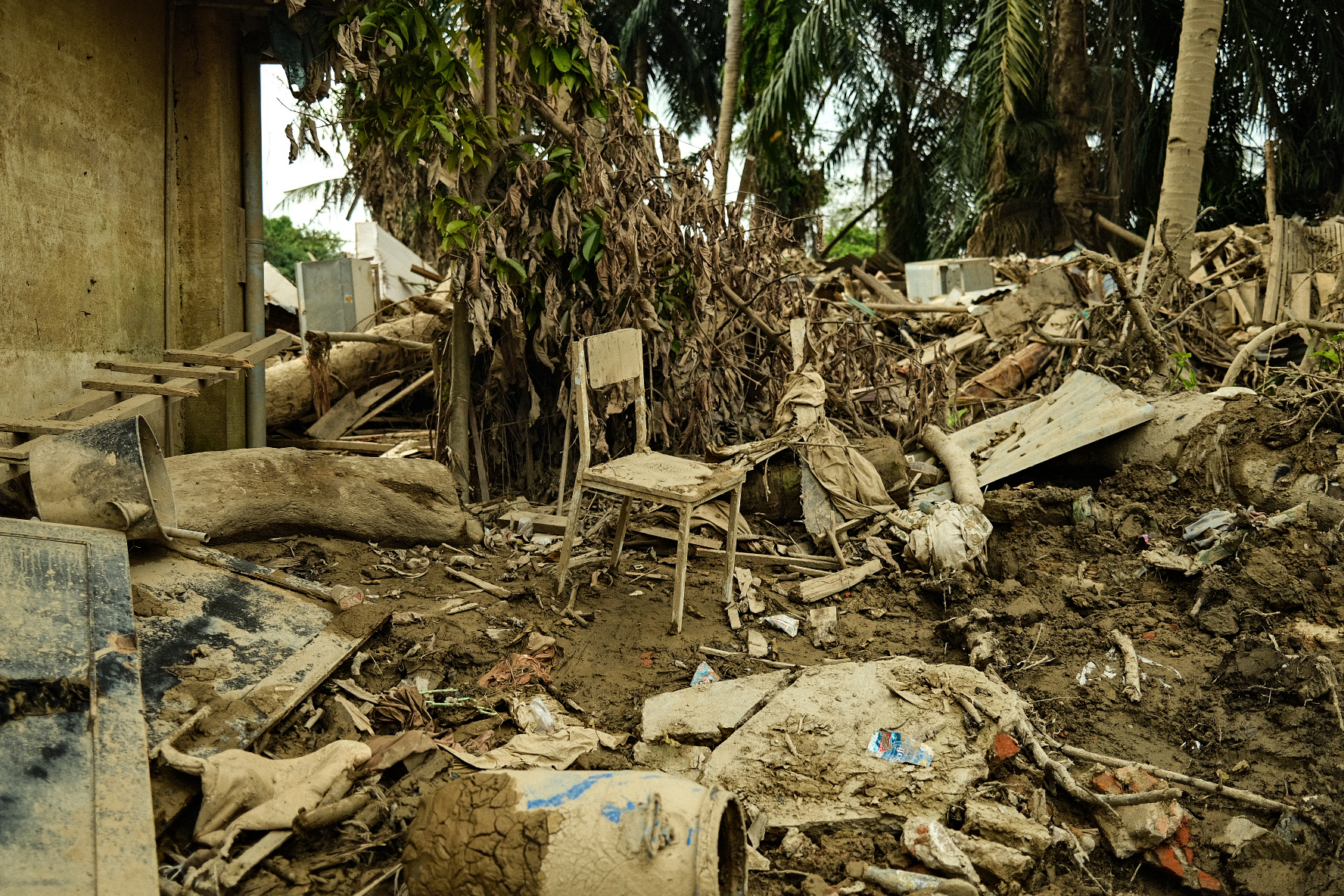 Debris is still scattered throughout Aceh Tamiang, and thick mud still covers the area.