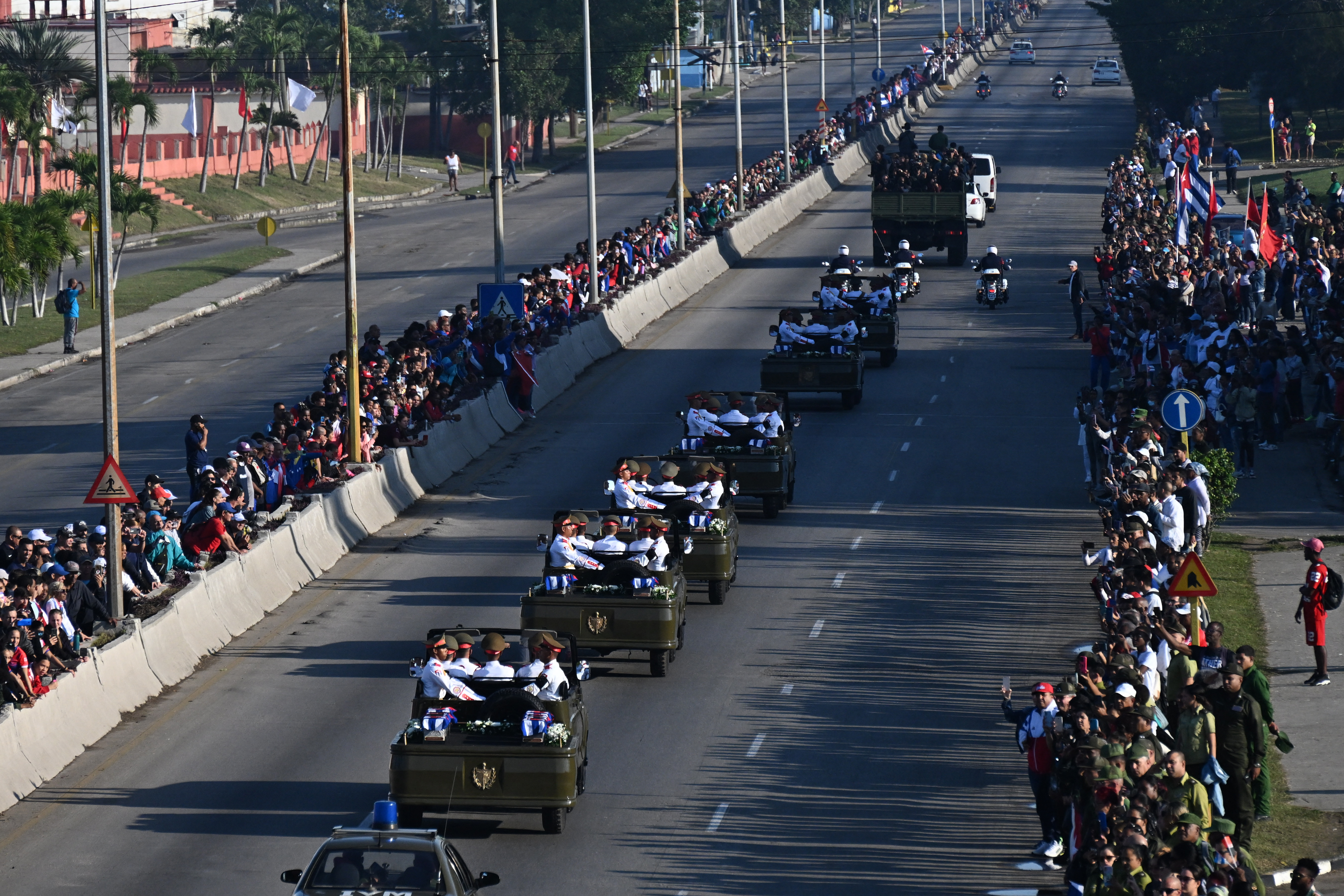 Cubans bid farewell to the funeral procession carrying the remains of the 32 Cuban soldiers who died during the US incursion to capture Venezuelan leader Nicolas Maduro