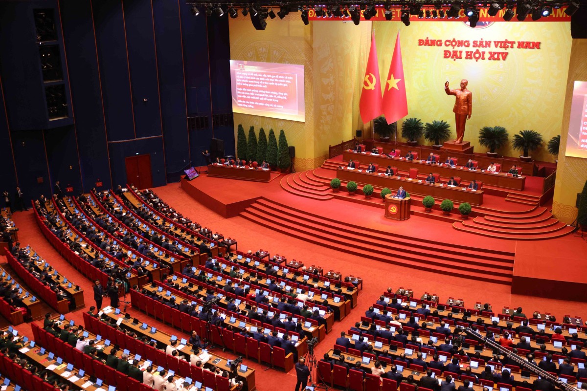 This handout photo taken on January 20, 2026 and released by the 14th National Congress via the Vietnam News Agency shows delegates taking part in the opening session of the 14th National Congress of the Communist Party of Vietnam at the National Convention Centre in Hanoi. (Photo by Handout / Vietnam News Agency (VNA) / AFP) / RESTRICTED TO EDITORIAL USE - MANDATORY CREDIT "AFP PHOTO /VIETNAM NEWS AGENCY" - HANDOUT - NO MARKETING NO ADVERTISING CAMPAIGNS - DISTRIBUTED AS A SERVICE TO CLIENTS
