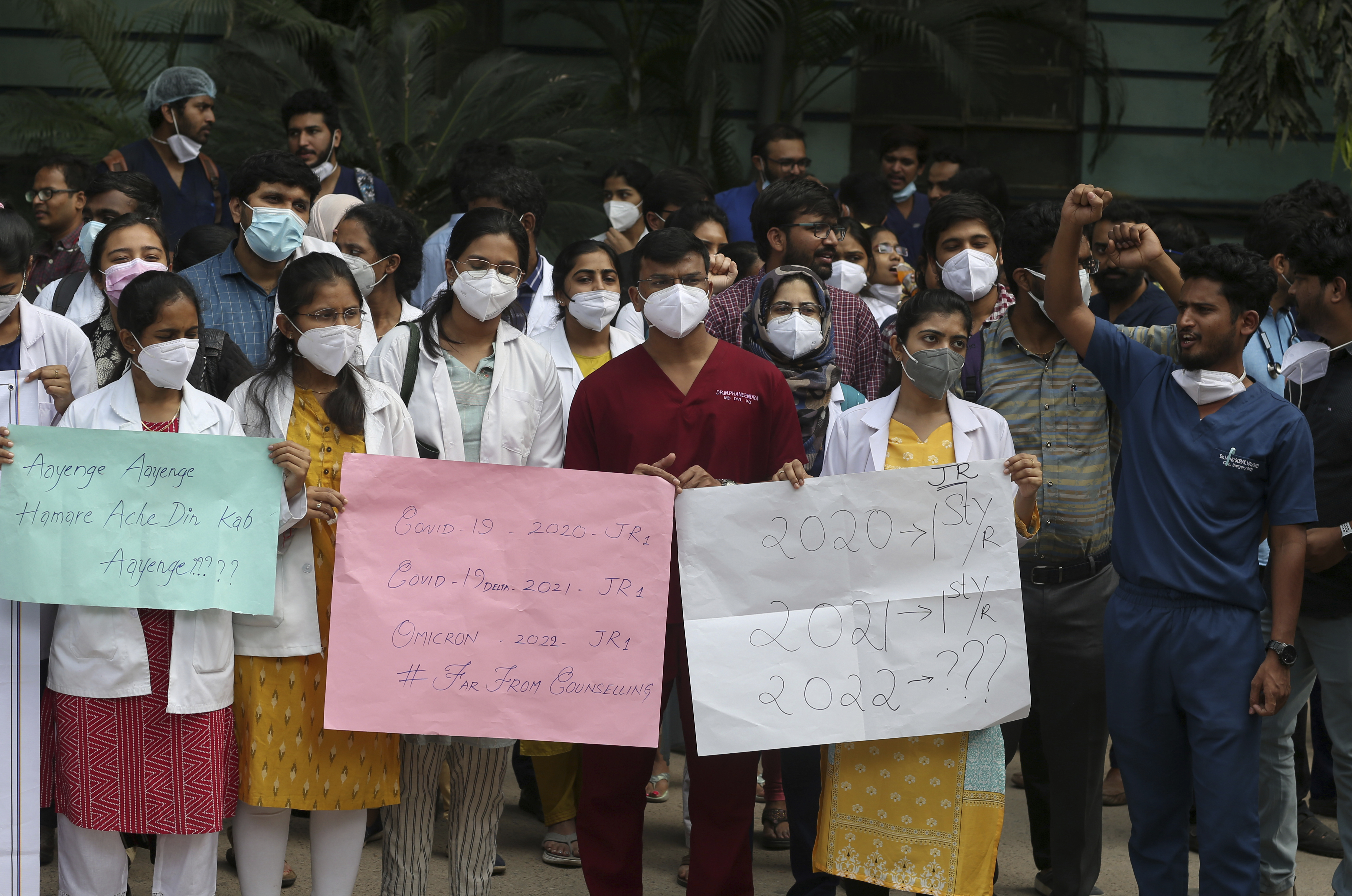 Osmania Medical College students shout slogans during a protest against the National Eligibility cum Entrance Test (NEET) PG counselling delay in Hyderabad, India, Friday, Dec. 3, 2021. (AP Photo/Mahesh Kumar A.)