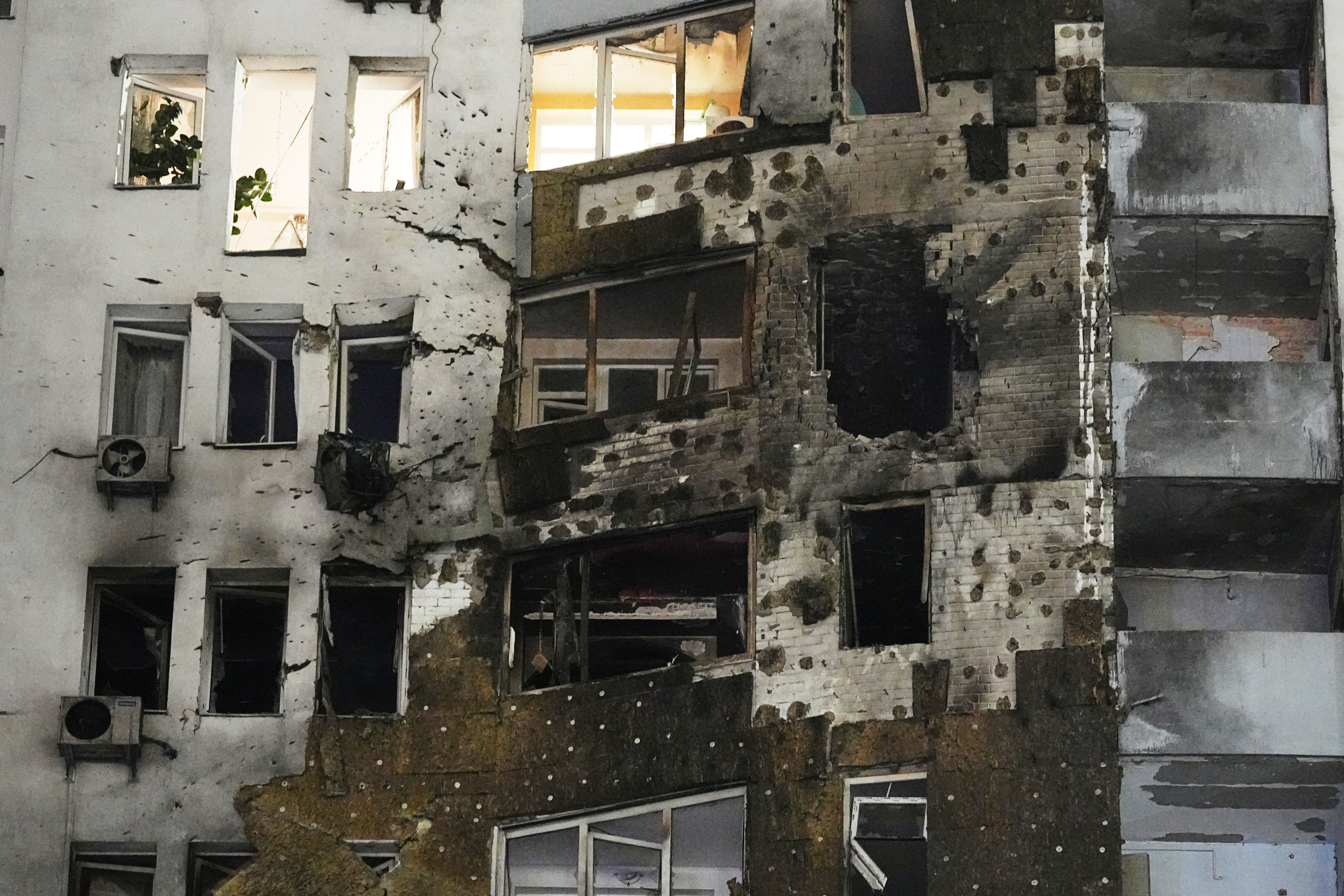 A residential building is damaged after a Russian strike in Kyiv, Ukraine, on January 9