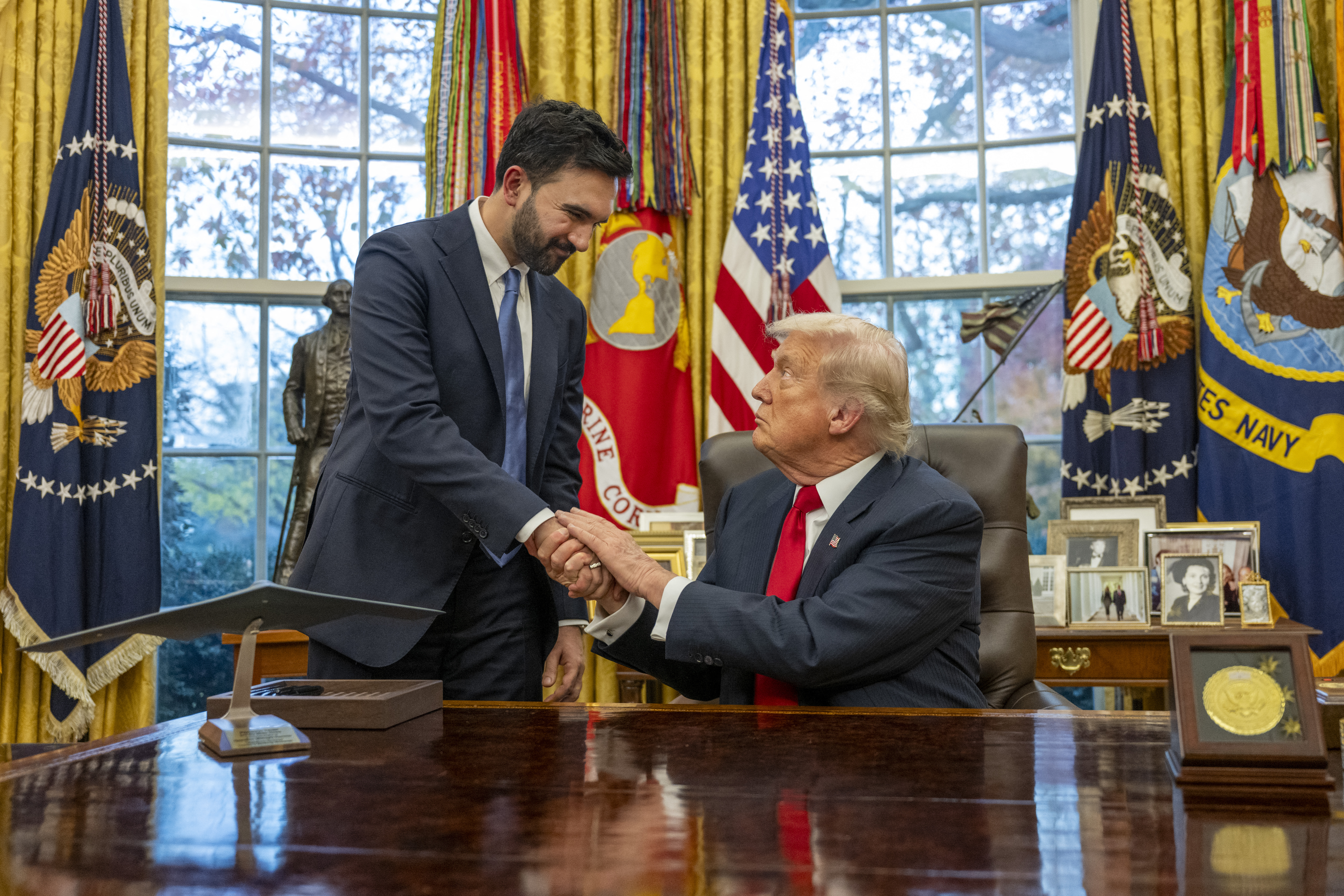 (FILES) US President Donald Trump (R) shakes hands with New York Mayor-elect Zohran Mamdani as they meet in the Oval Office of the White House in Washington, DC, on November 21, 2025.