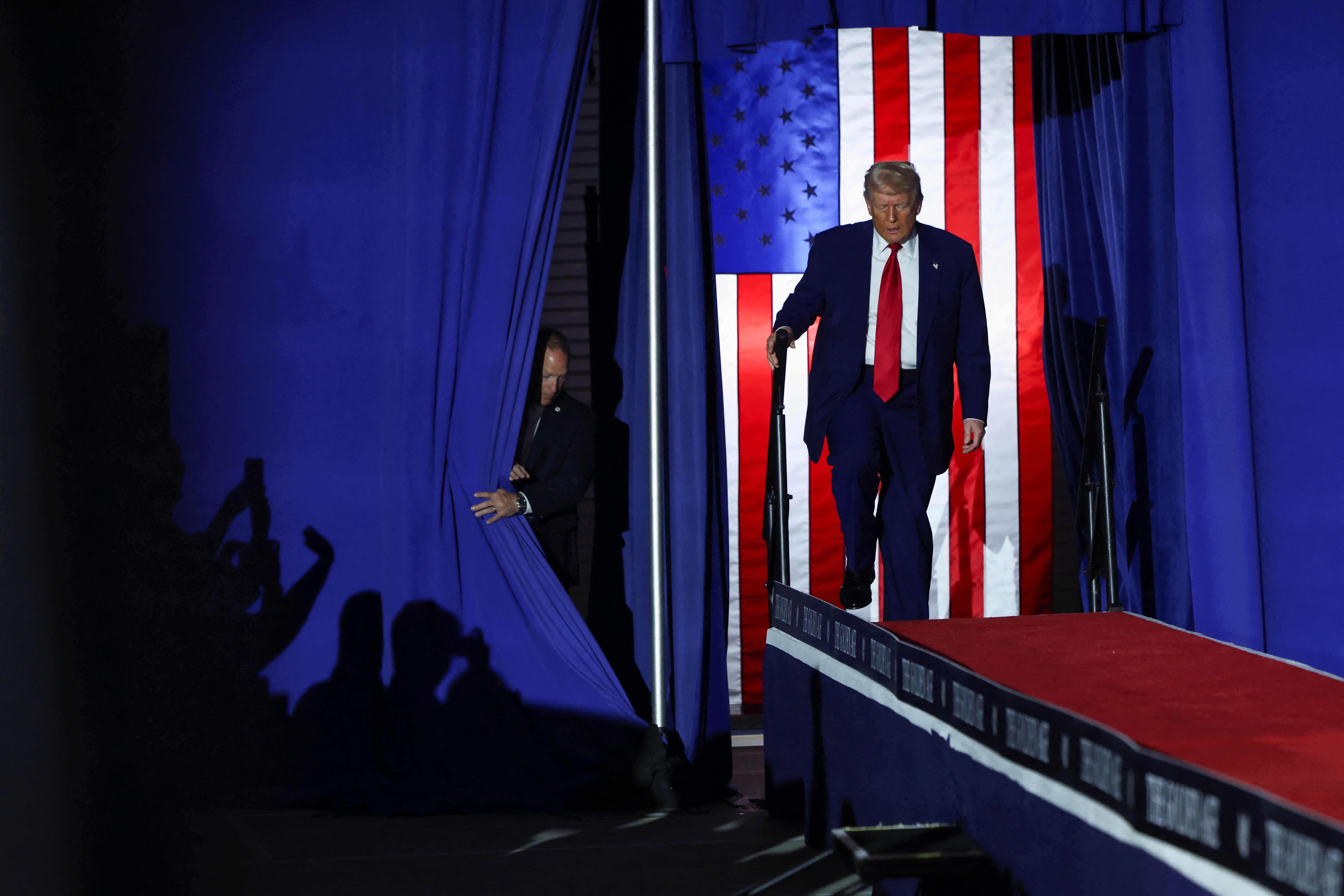 Trump enters stage