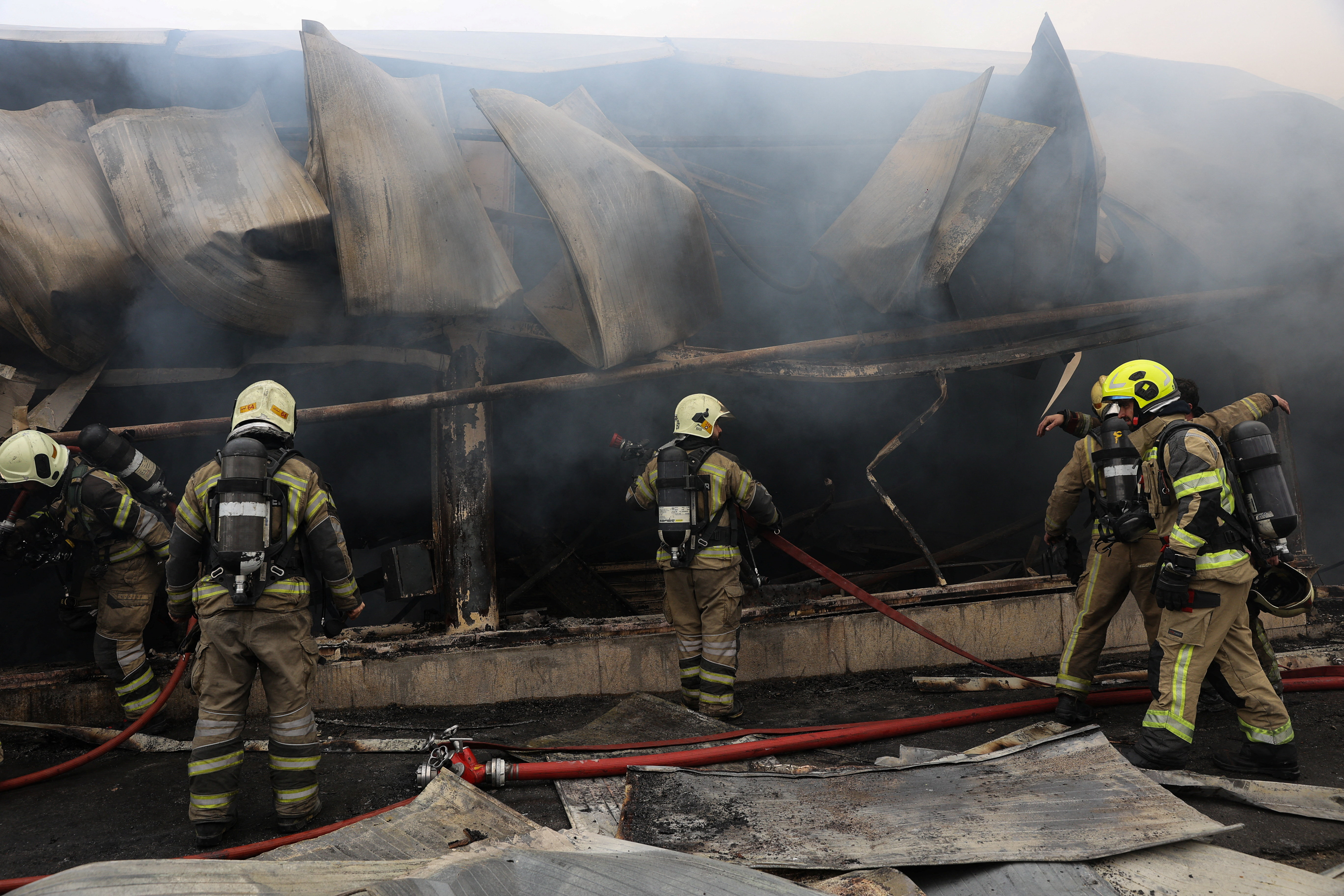 Major Tehran bazaar fire that sent thick smoke over city is under control, with no injuries reported.