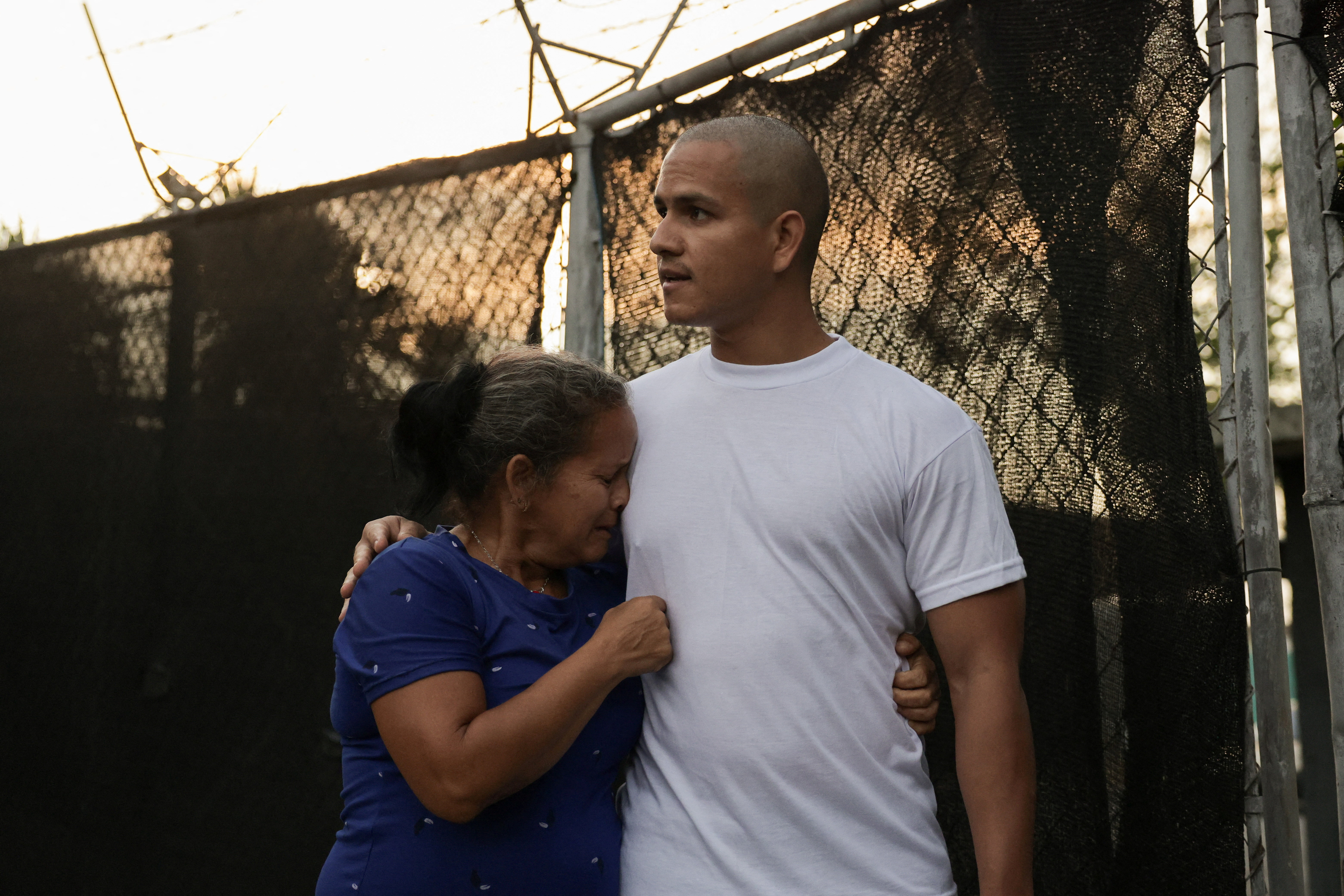 A prisoner is received by a family member after his release from the Rodeo detention centre after Venezuelan lawmakers approved a limited amnesty bill, in Guatire, Venezuela