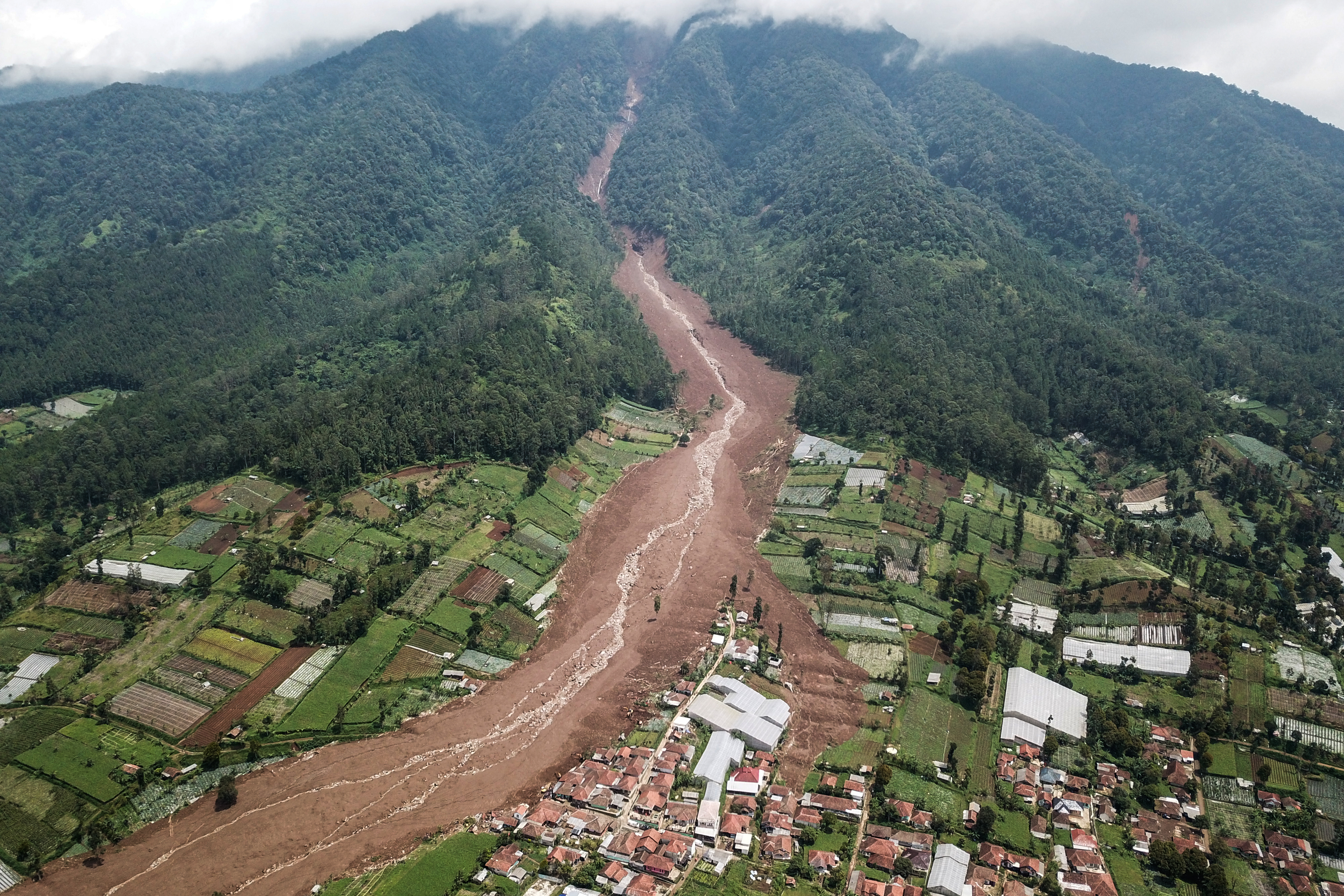 An aerial picture shows a landslide at Pasirlangu village in Cisarua, Bandung, West Java