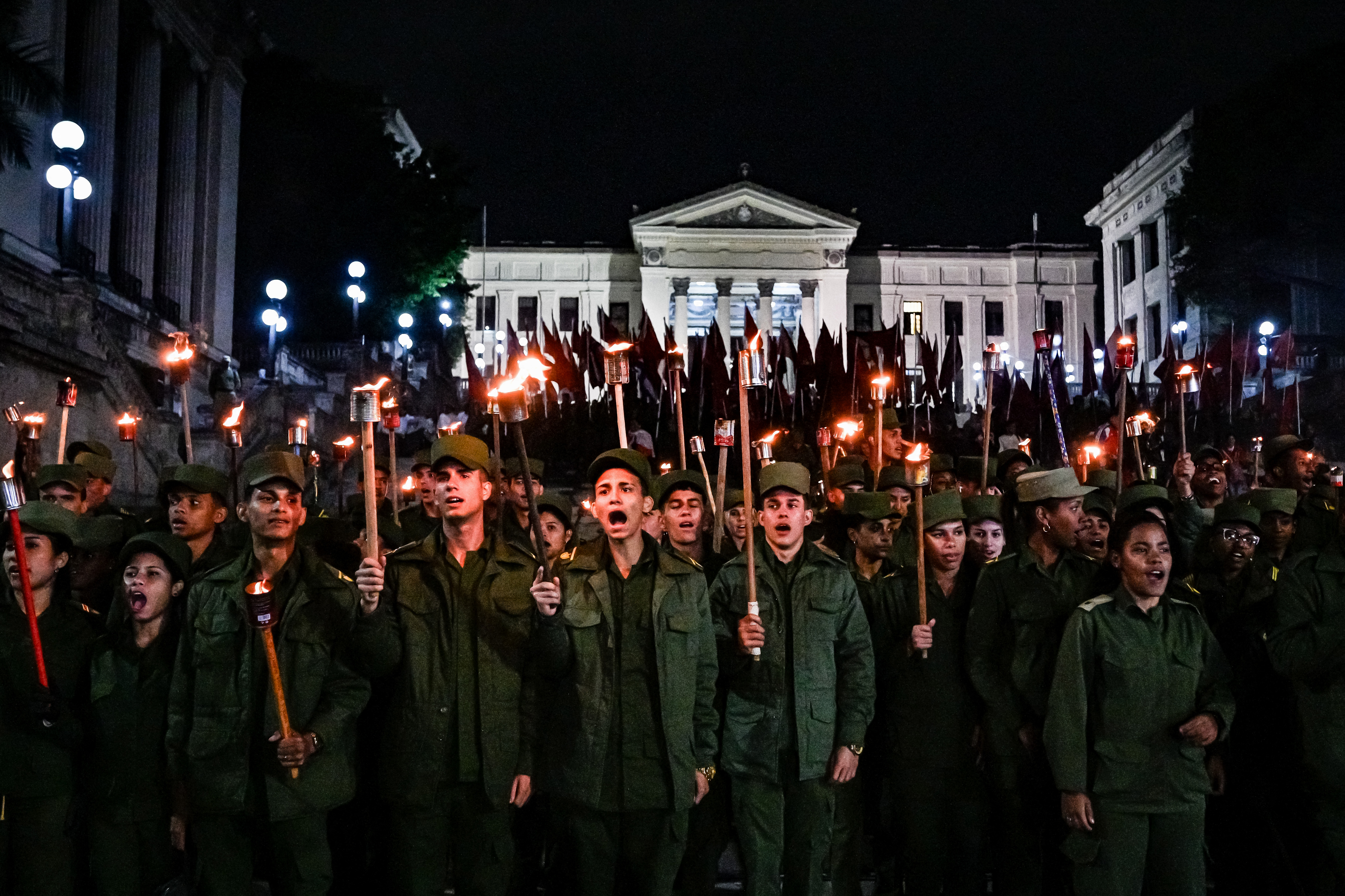 Cuban soldiers take part in the Torchlight March on the 173rd anniversary of National Hero Jose Marti (a leader of Cubas independence from Spain and founder of the Cuban Revolutionary Party) in Havana