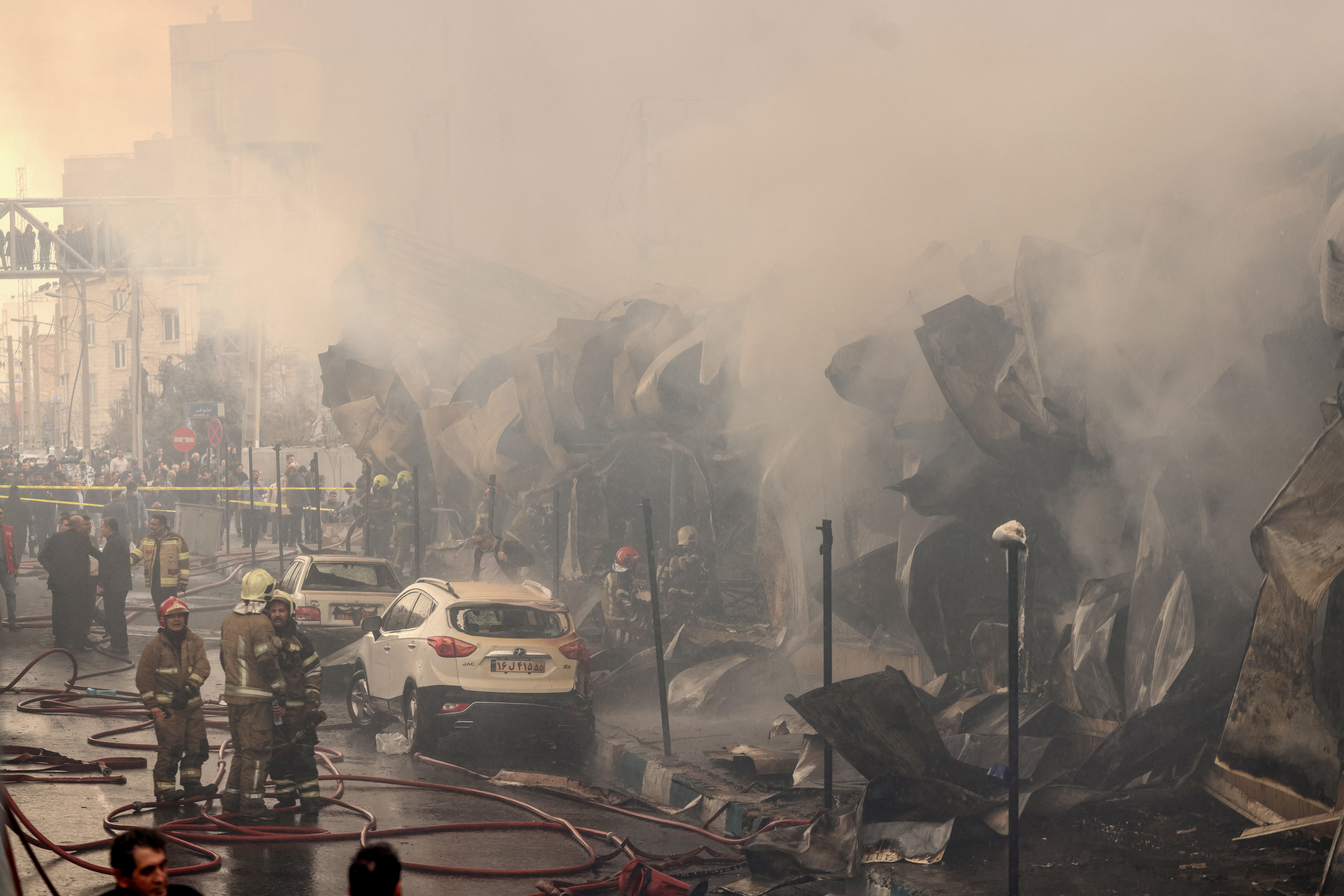 Major Tehran bazaar fire that sent thick smoke over city is under control, with no injuries reported.