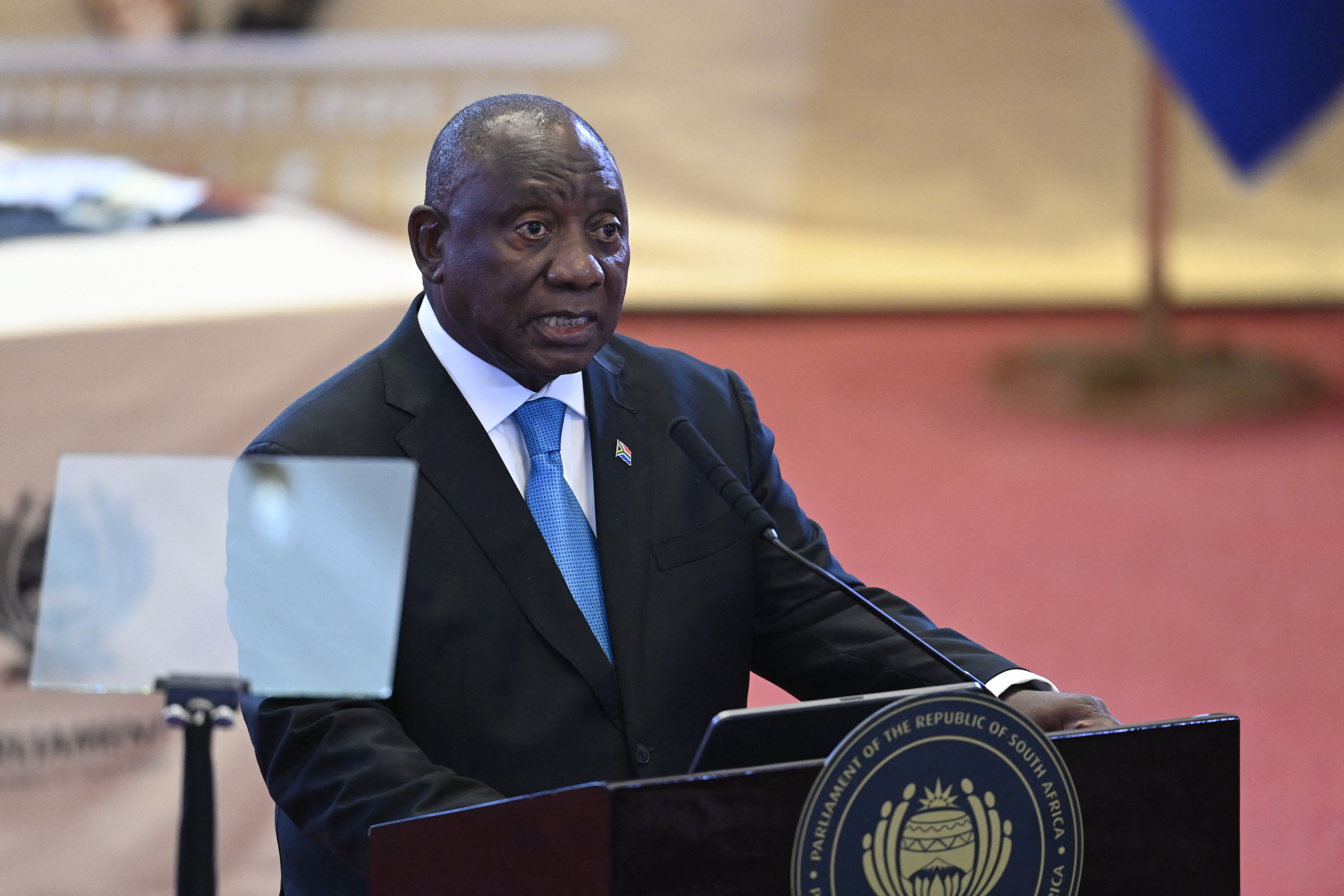 South African President Cyril Ramaphosa delivers the State of the Nation (SONA) address in Cape Town on February 12, 2026. (Photo by Rodger Bosch / POOL / AFP)