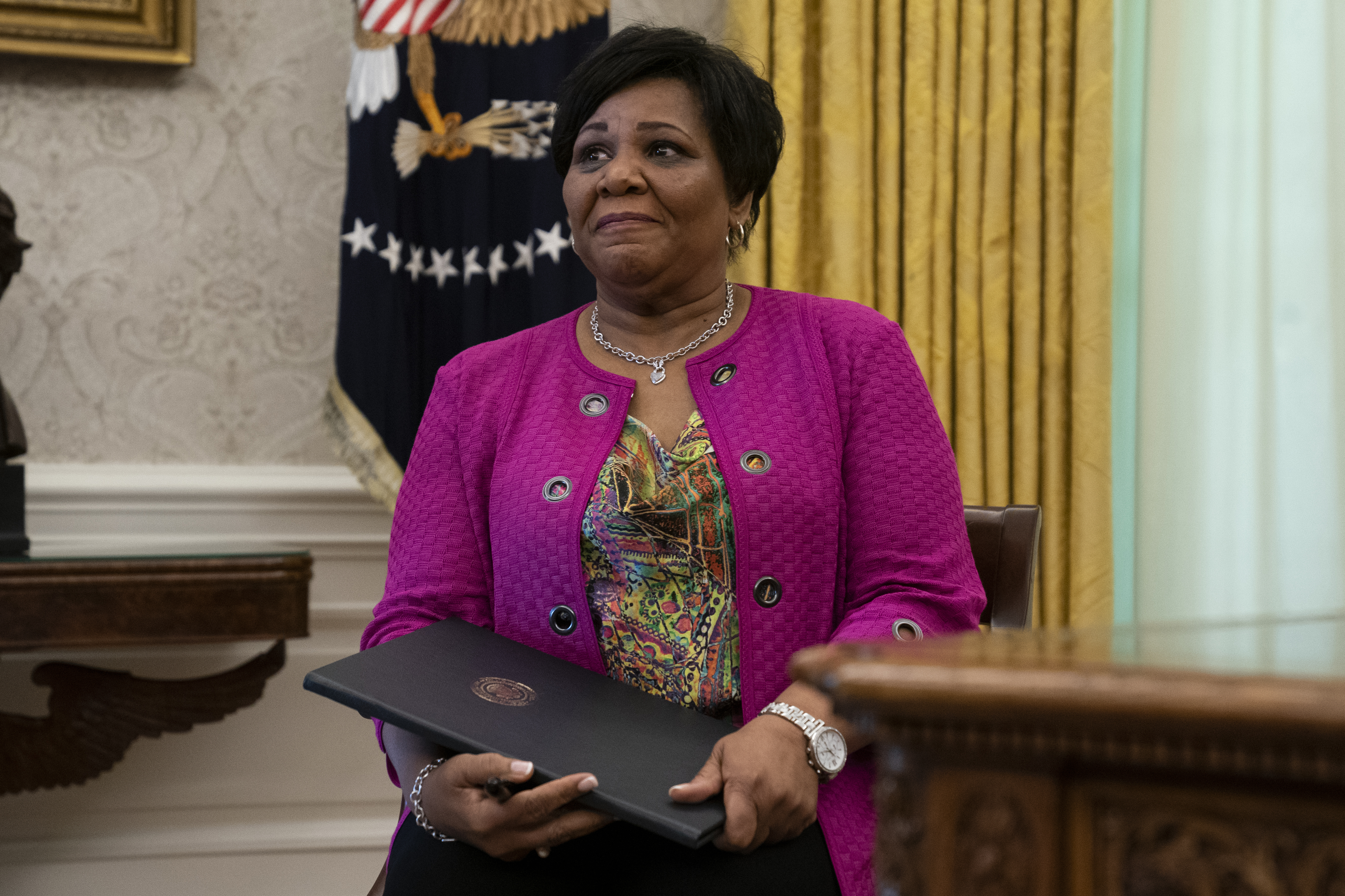 Alice Johnson seated in the Oval Office