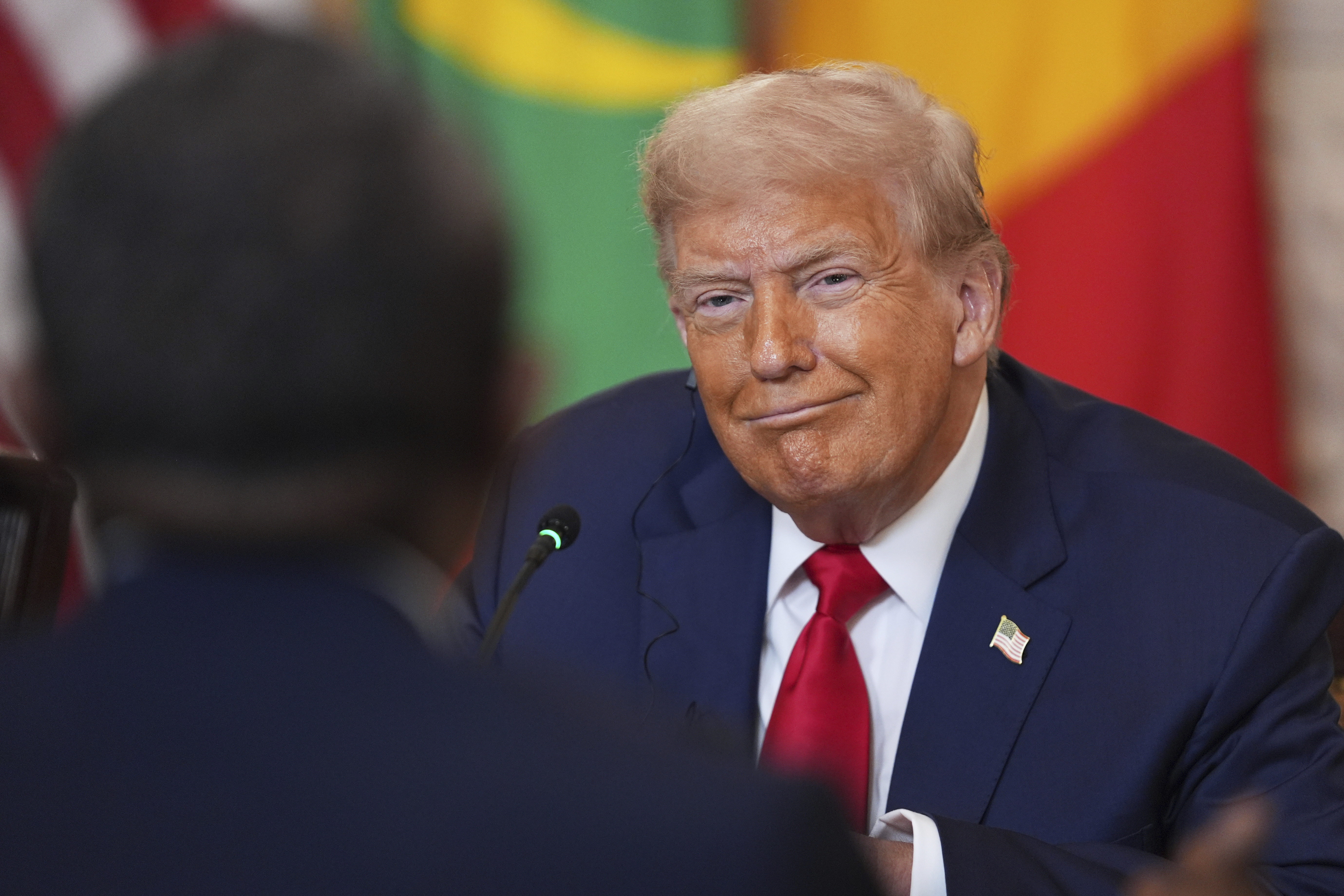 Donald Trump sits at a lunch with African leaders