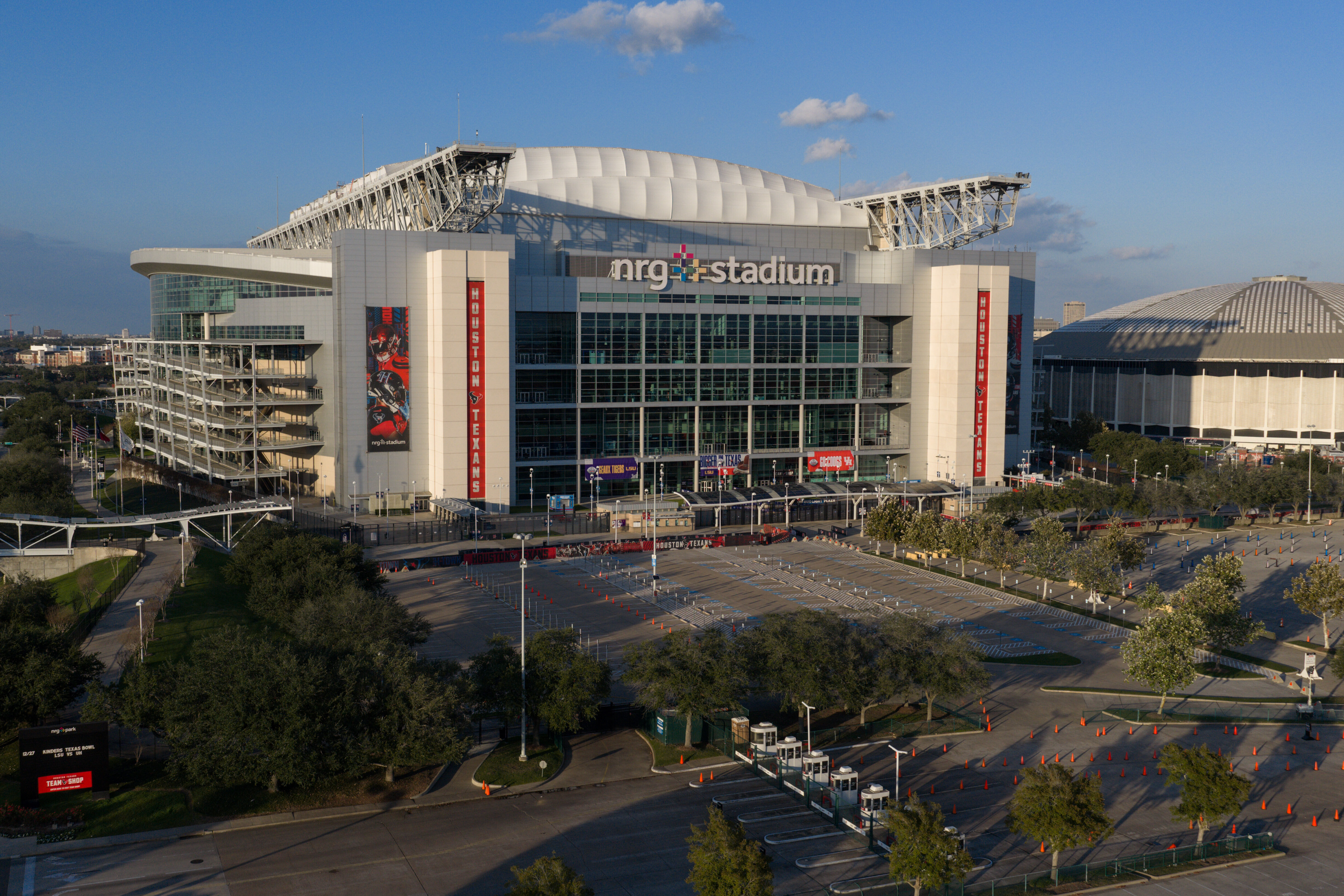 An aerial view of the NRG Stadium, one of the stadiums that will host 2026 FIFA World Cup matches, in Houston, Dec. 28, 2025. The Astrodome is pictured on right. (AP Photo/Jon Shapley)
