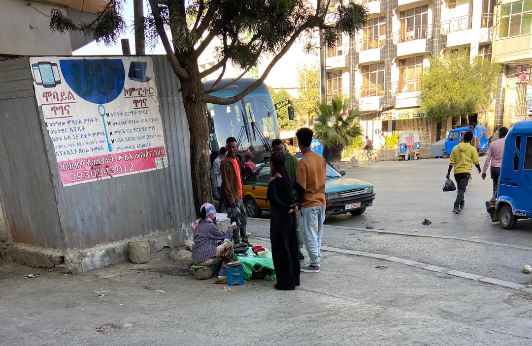 Saba Gedion, 21, sells coffee on a street in Tigray