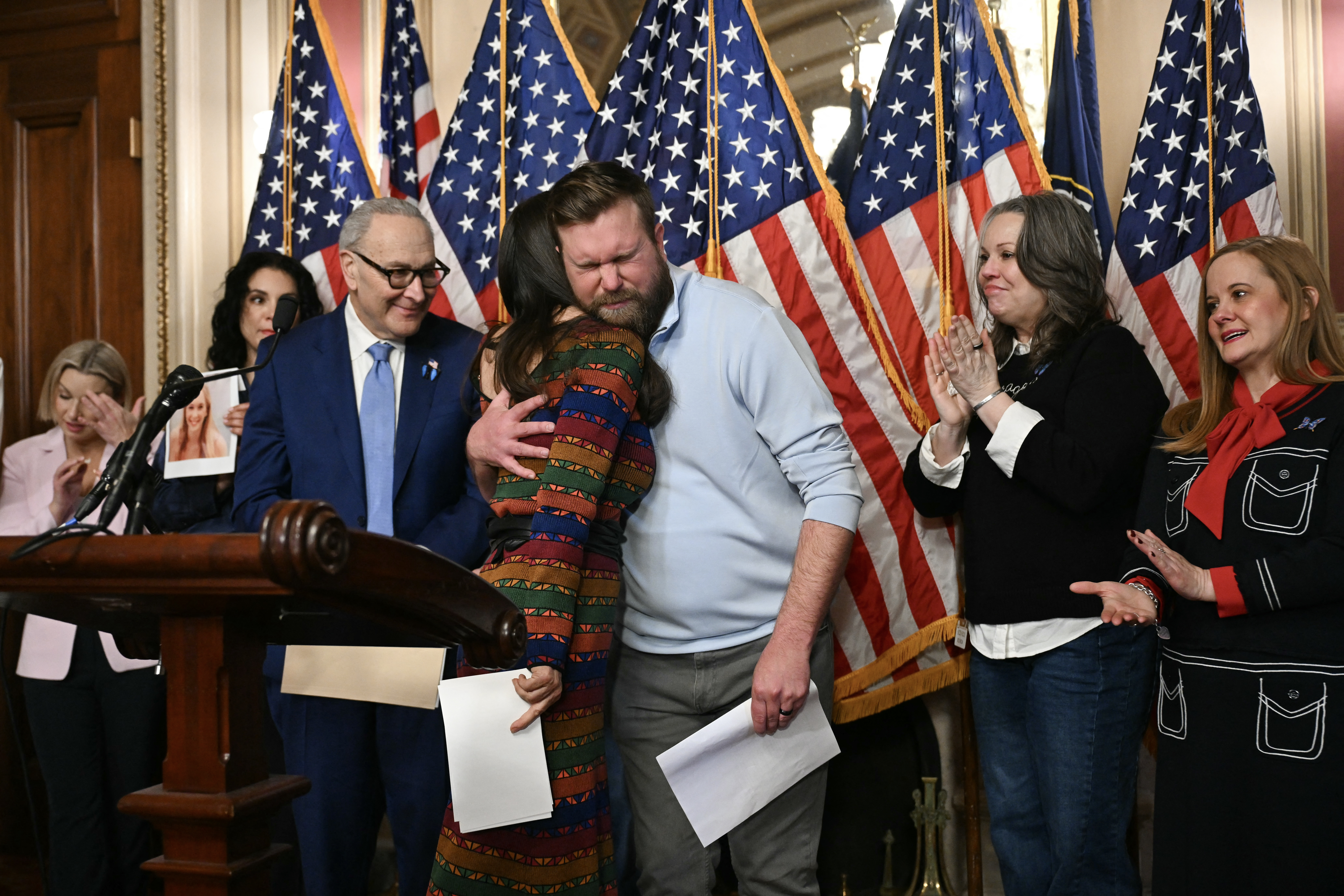 Democratic Representative Teresa Leger Fernandez embraces Sky Roberts, brother of Virginia Giuffre, an accuser of Jeffrey Epstein