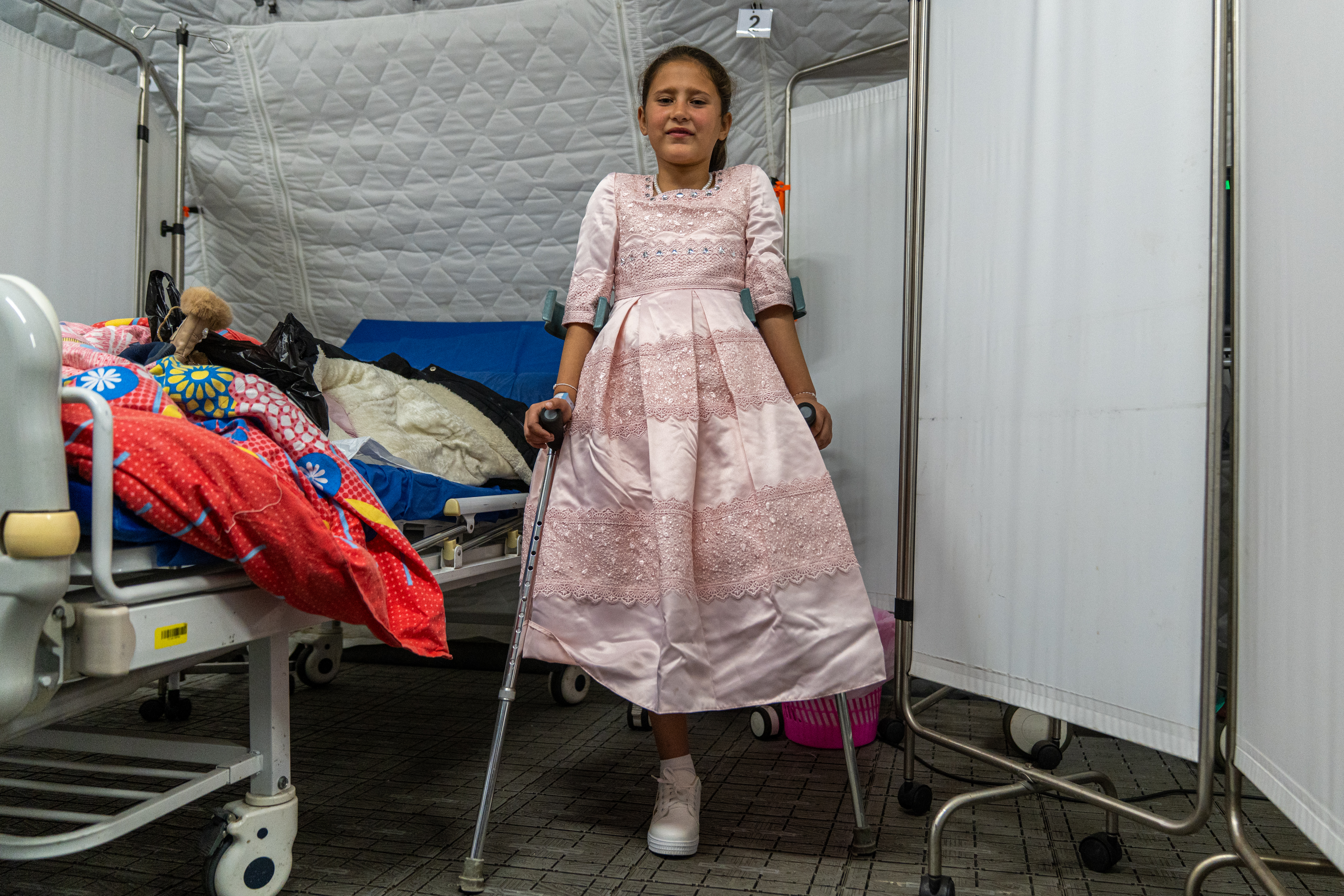 ARISH, EGYPT - FEBRUARY 5: Maha, 10 years old, had her foot amputated after being exposed to shelling in a tent in Gaza, and she left to receive medical treatment in Egypt at the UAE "floating hospital" on February 5, 2026 in Arish, Egypt. The hospital, sponsored by the United Arab Emirates, provides medical and humanitarian services to Palestinians who have been evacuated from the Gaza Strip. The nearby Rafah crossing between Egypt and Gaza reopened earlier this week, allowing a small number of Palestinians to cross in either direction. (Photo by Ali Moustafa/Getty Images)