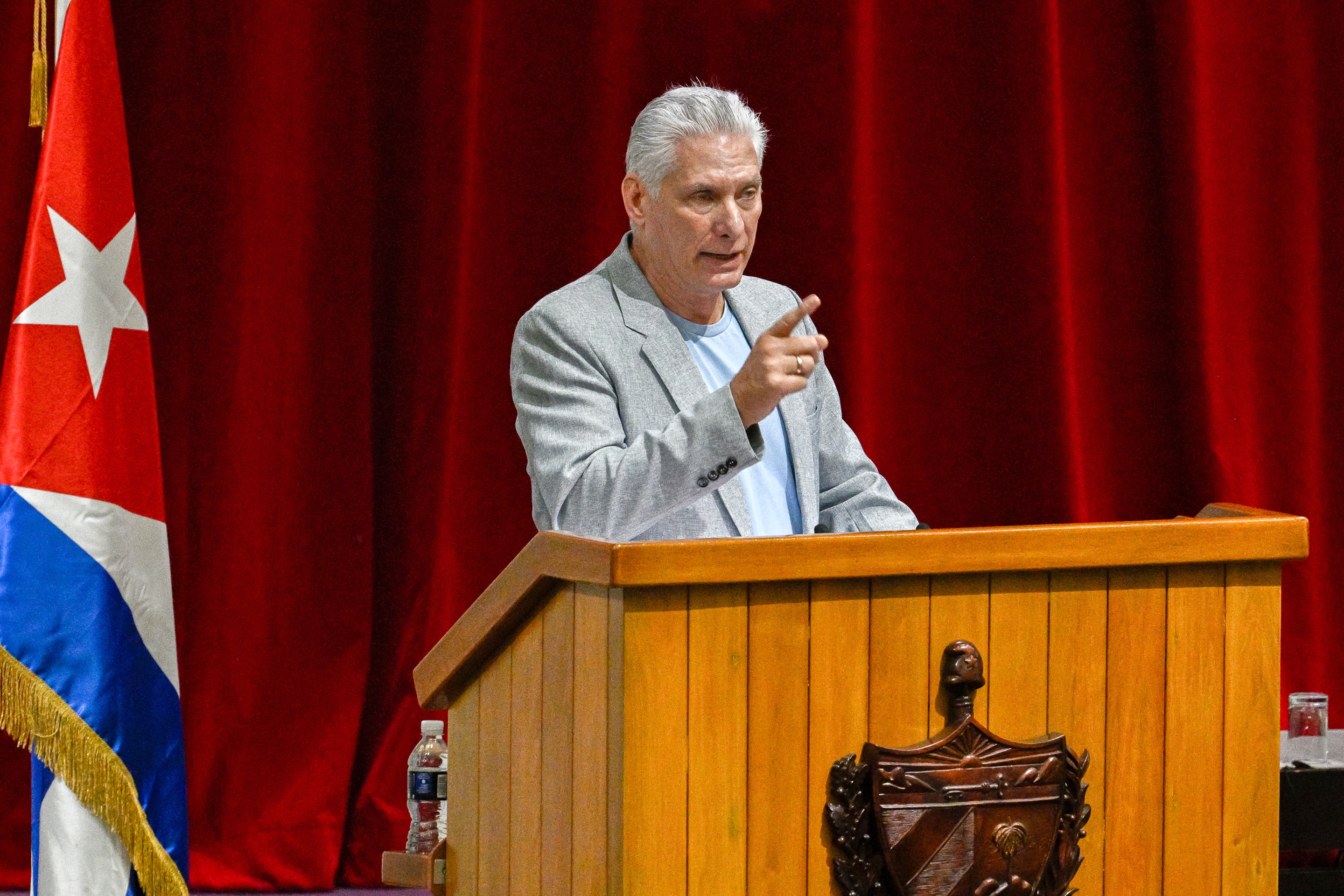 Cuban President Miguel Diaz-Canel delivers a welcome address to politicians and activists of the Our America Convoy at the Convention Palace in Havana