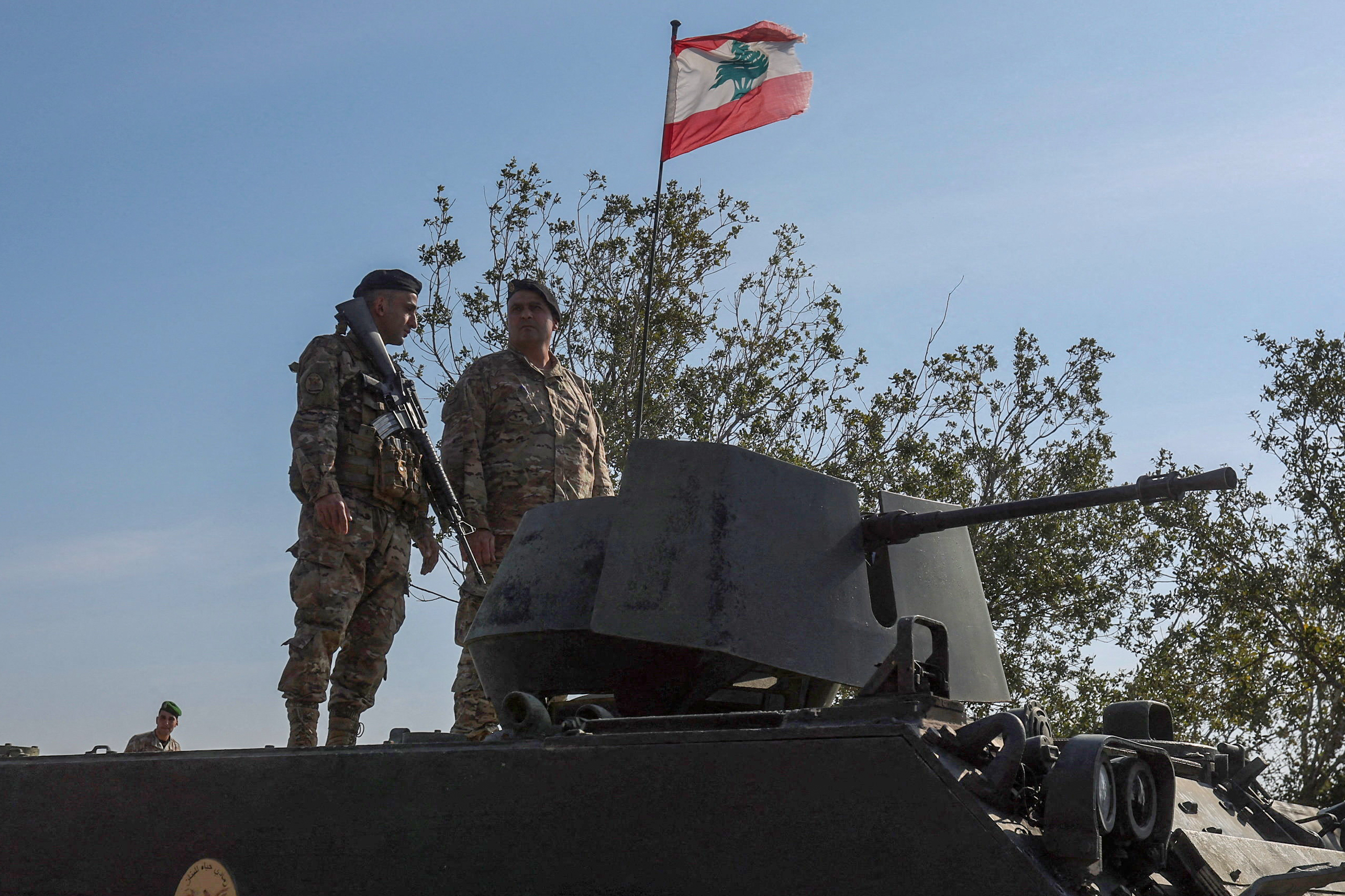 Lebanese army members stand on a military vehicle during a Lebanese army media tour, to review the army's operations in the southern Litani sector, in Alma ash-Shaab, near the border with Israel, southern Lebanon, November 28, 2025 [Aziz Taher/Reuters]