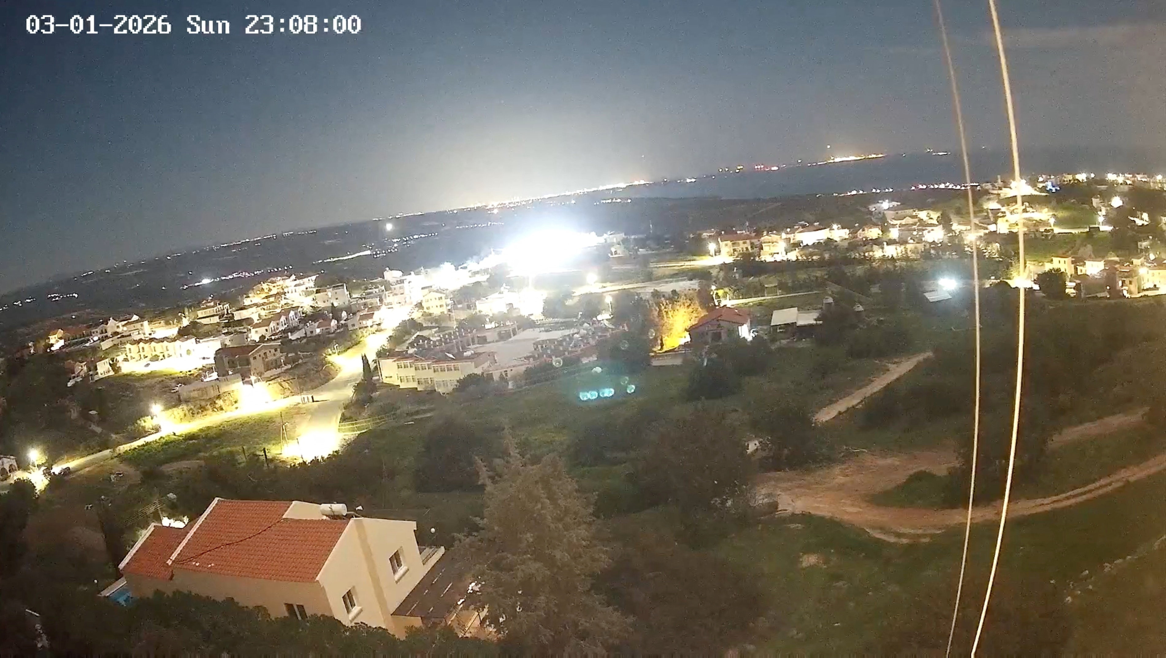 Flashes appear in the sky over RAF Akrotiri, as seen from Pissouri, Limassol District, Cyprus in this screen grab taken from a handout video obtained on March 2, 2026. KitasWeather/Handout via REUTERS THIS IMAGE HAS BEEN SUPPLIED BY A THIRD PARTY. MANDATORY CREDIT. Verification lines: Reuters verified the location from the buildings, the road layout and the coastline seen in the video, which matched satellite imagery of the area. The date when the video was recorded was verified from the timestamp on the webcam. The flashes in the video were seen in the direction of the UK military base. Statements from Cypriot and British officials on Monday (March 2) said that a drone hit a British air base in Cyprus overnight.