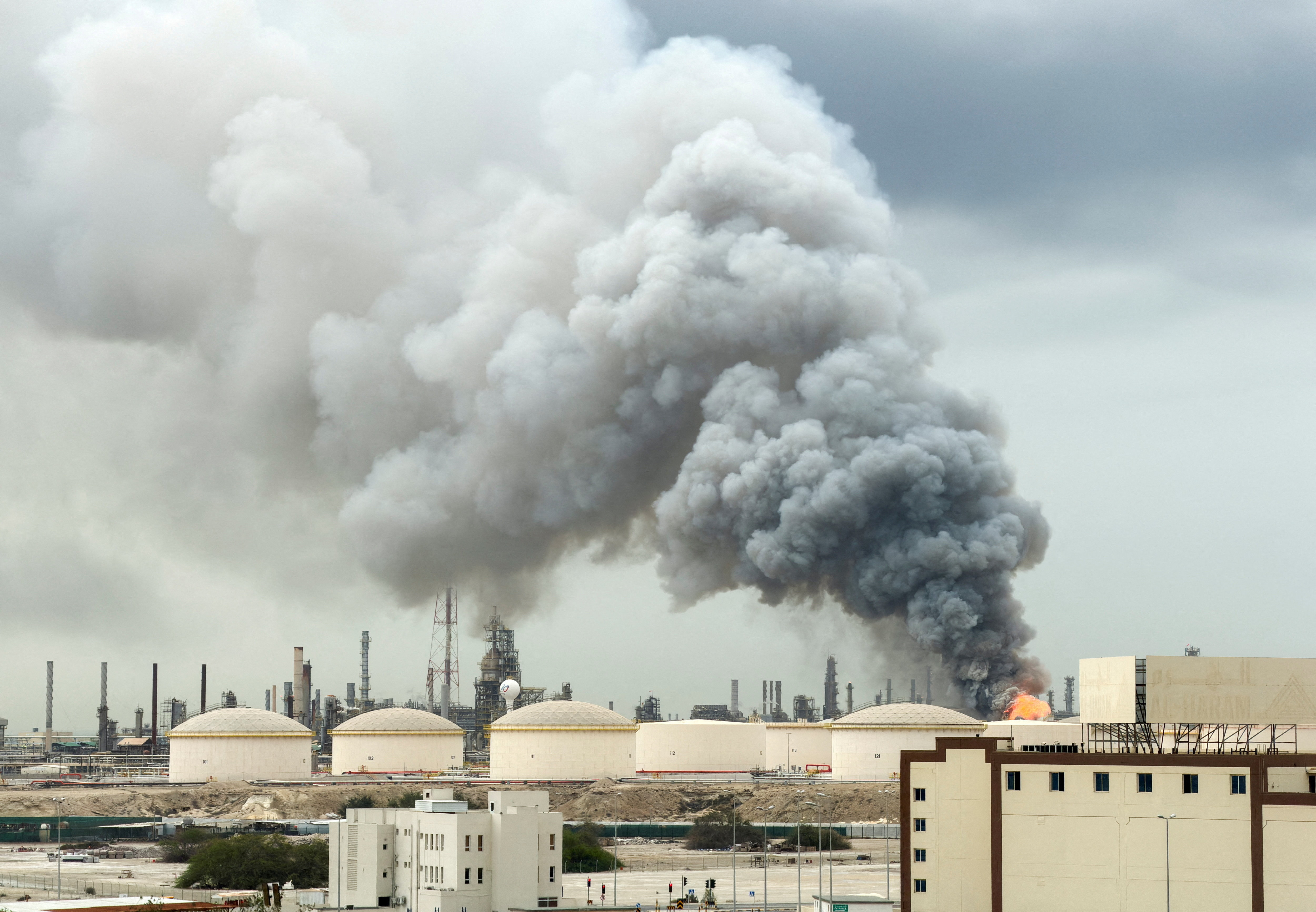 Smoke rises following a strike on the Bapco Oil Refinery, amid the U.S.-Israeli conflict with Iran, on Sitra Island Bahrain,
