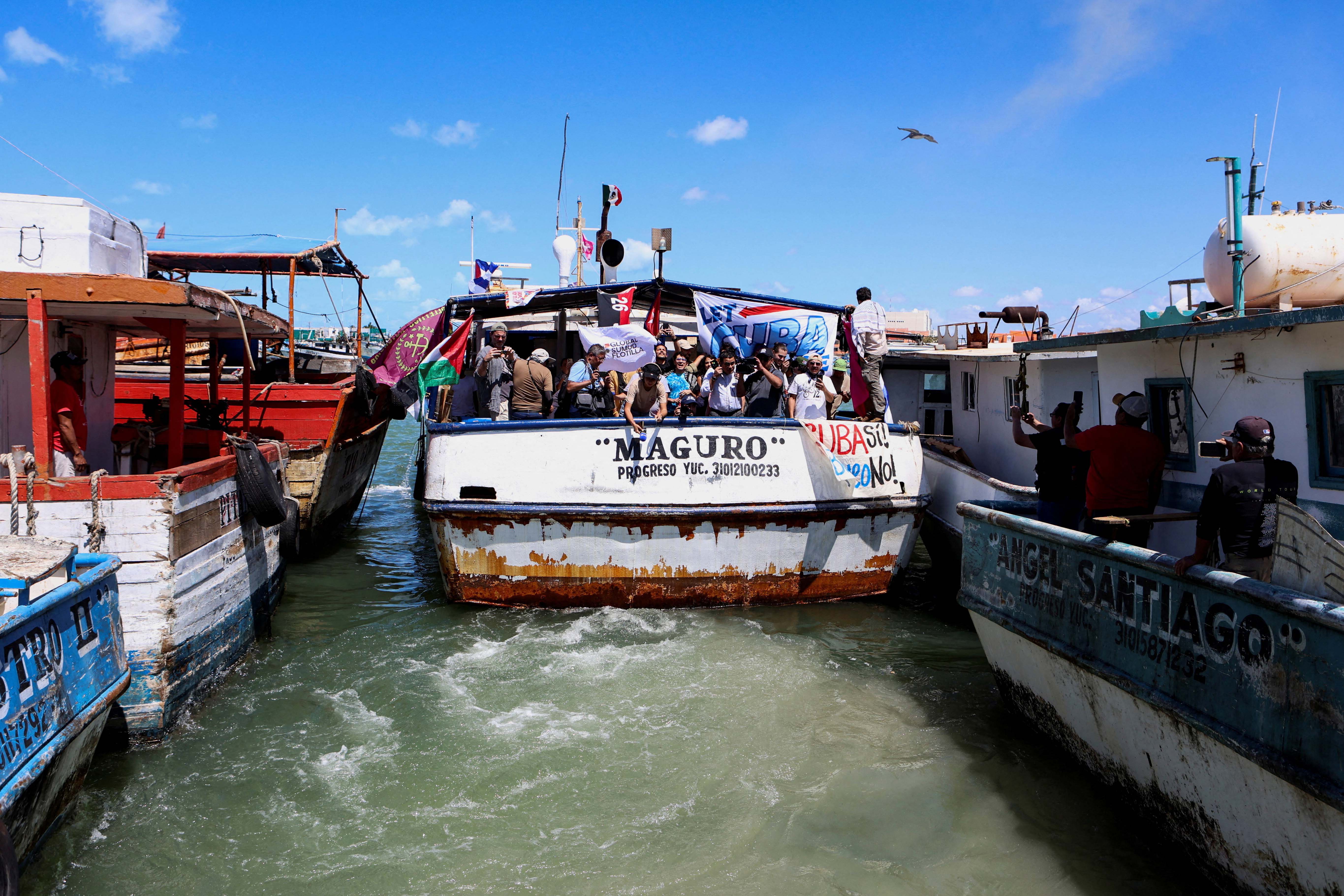 Activists, accompanied by members of the media, set sail for Cuba with essential goods as part of the Nuestra America Convoy flotilla from the port of Yucalpeten, in Progreso, Yucatan state, Mexico, March 20, 2026. [Lorenzo Hernandez/Reuters]