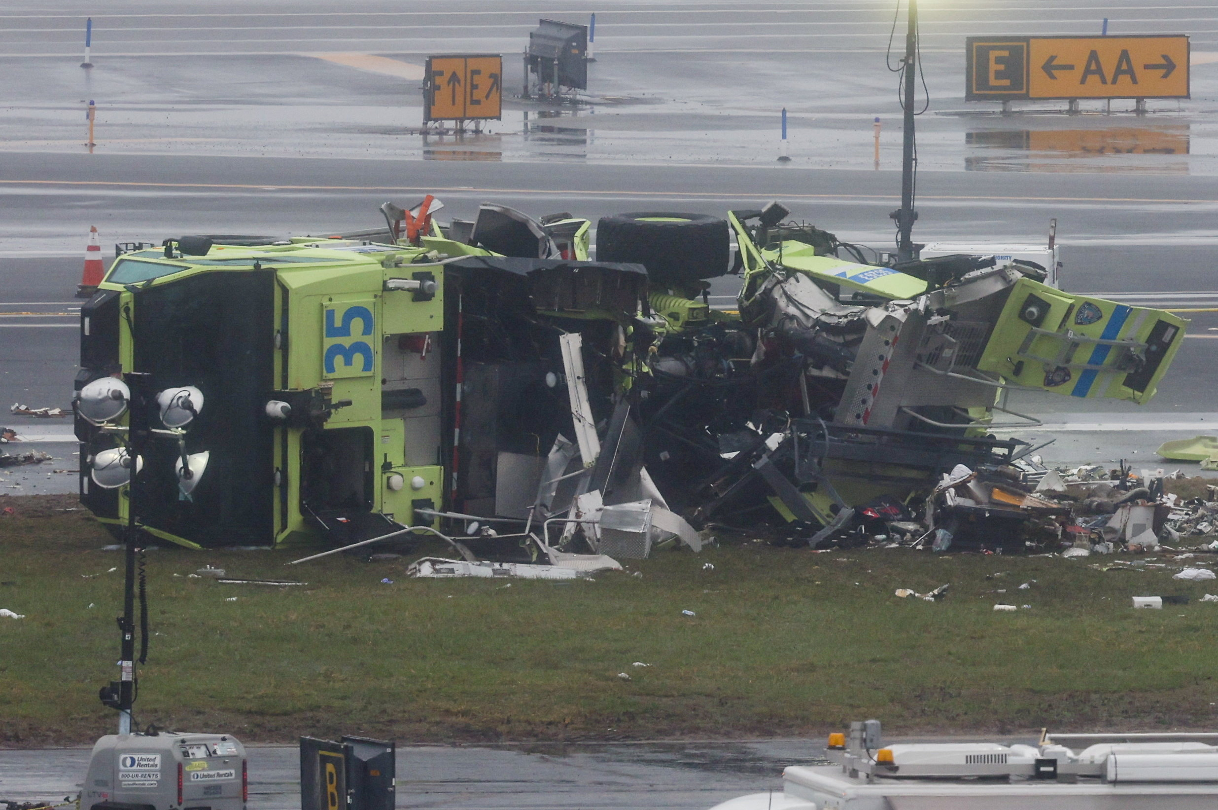 A damaged fire truck at the scene after an Air Canada Express jet collided with a ground vehicle at New York's LaGuardia Airport in Queens