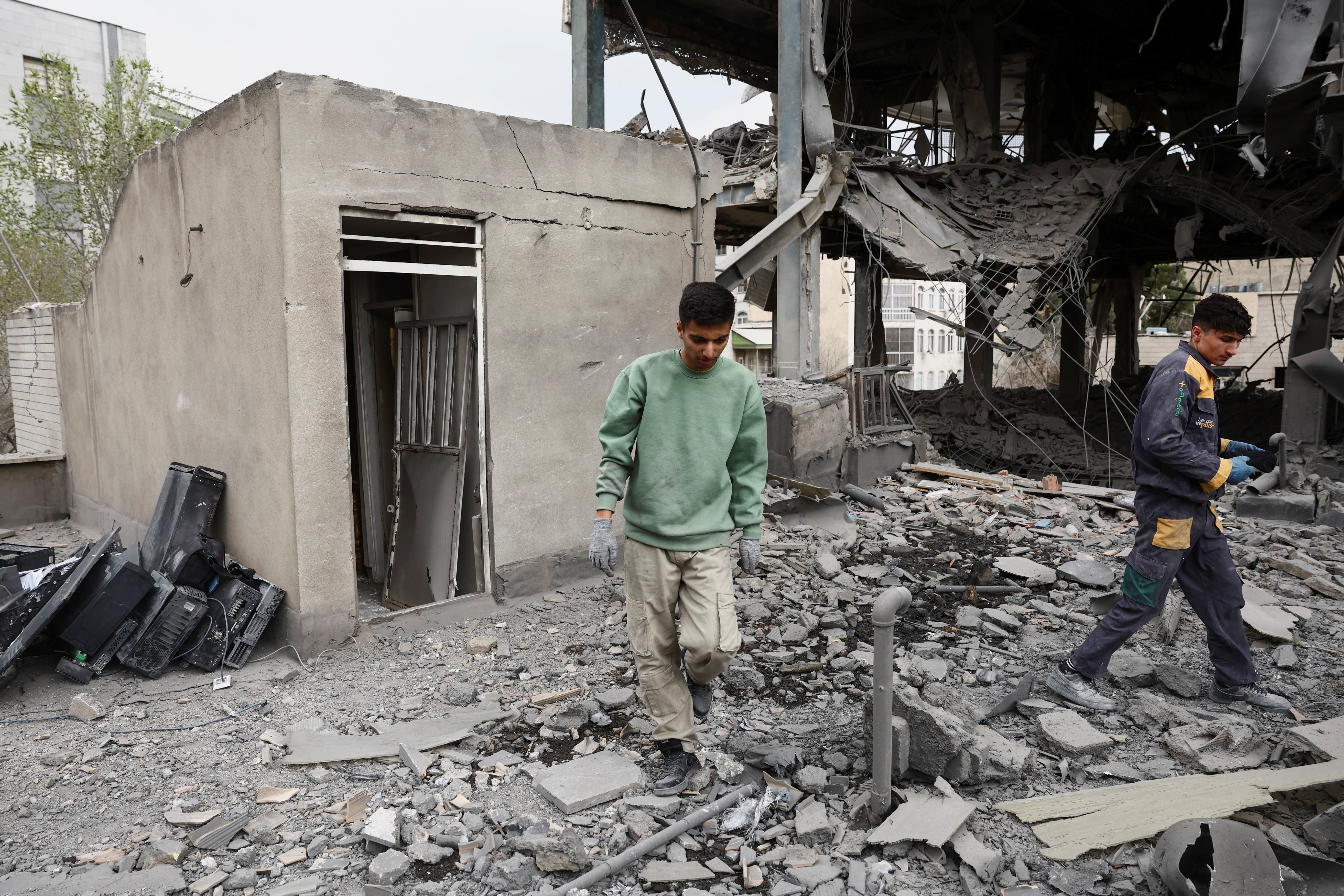 A view of the Qatari Al-Araby TV and business building damaged by a strike