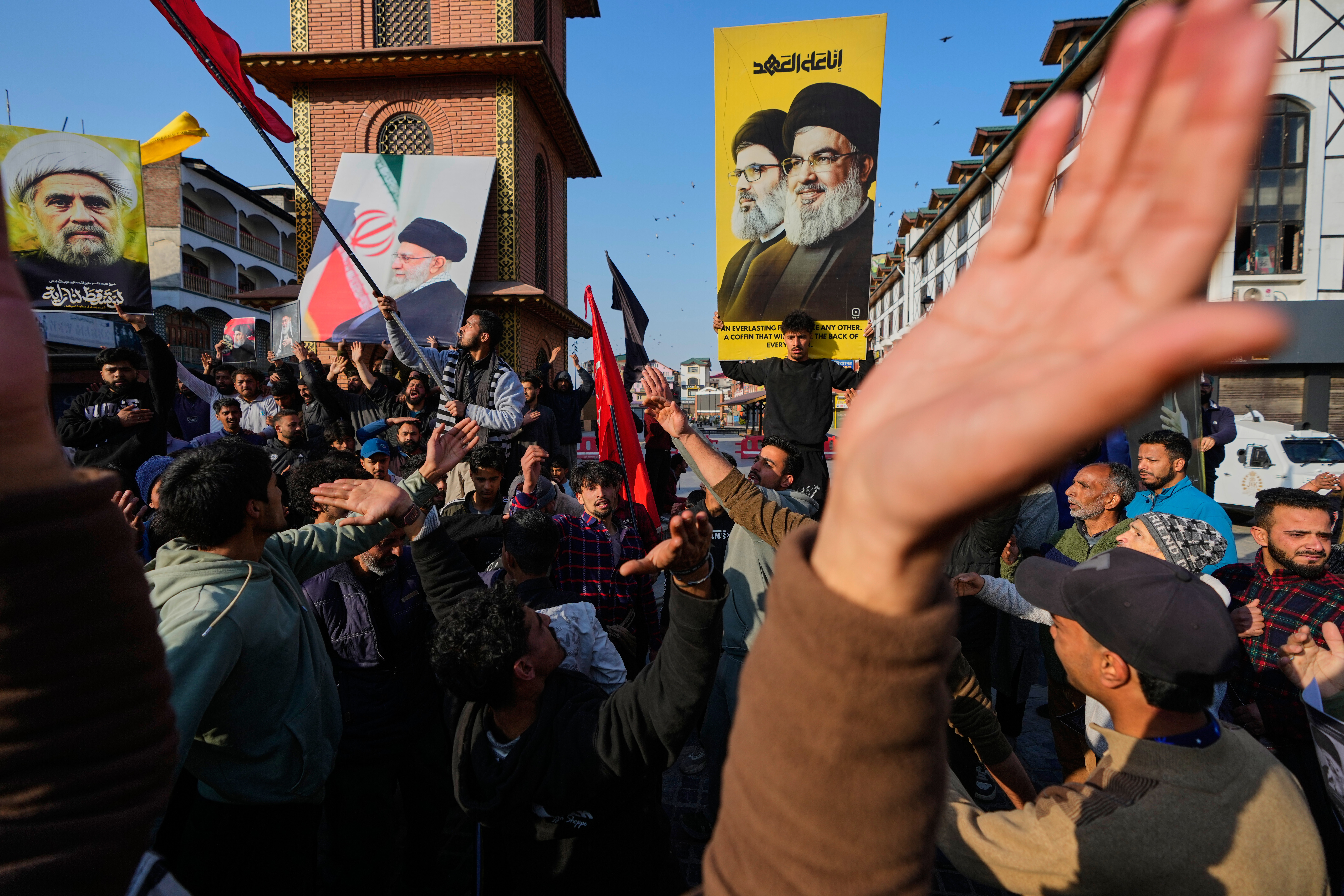 Shiite Muslims mourn the killing of Iranian Supreme Leader Ayatollah Ali Khamenei during a protest against the U.S. and Israel in Srinagar, Indian controlled Kashmir, Sunday, March 1, 2026. (AP Photo/Mukhtar Khan)