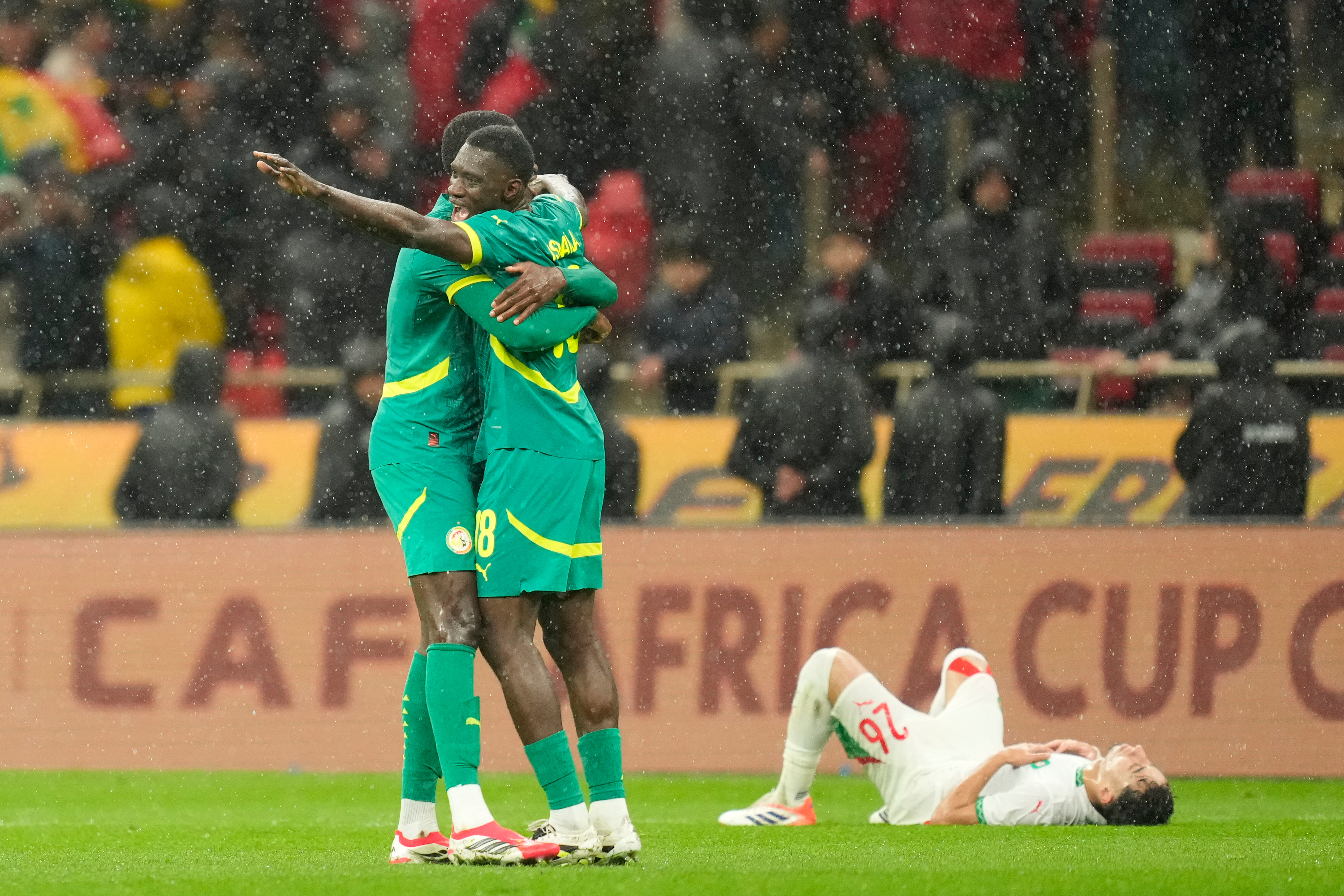 Senegal players celebrate after winning the Africa Cup of Nations final against Morocco in January 2026