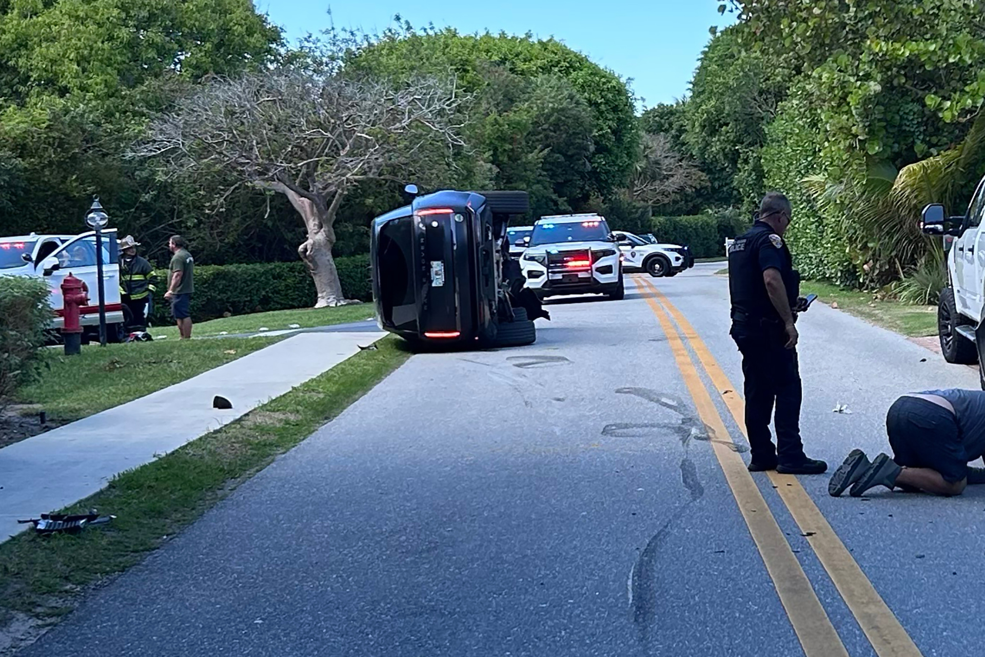 skid marks near the overturned vehicle in a rollover crash which involved Tiger Woods