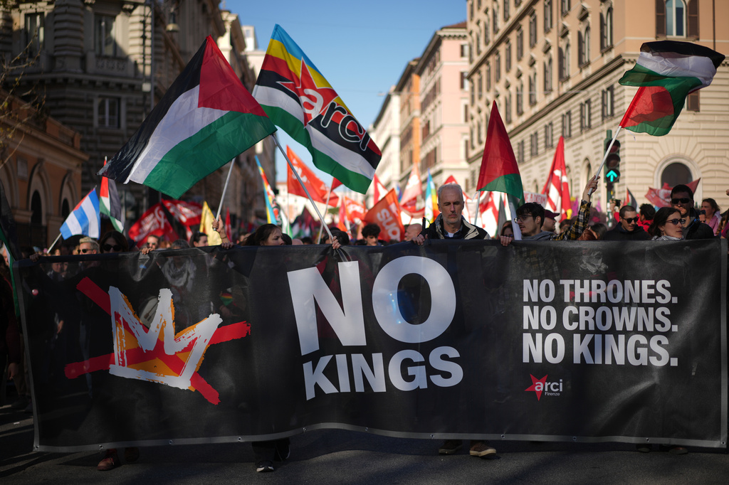 Marchers in Italy demonstrate against Donald Trump