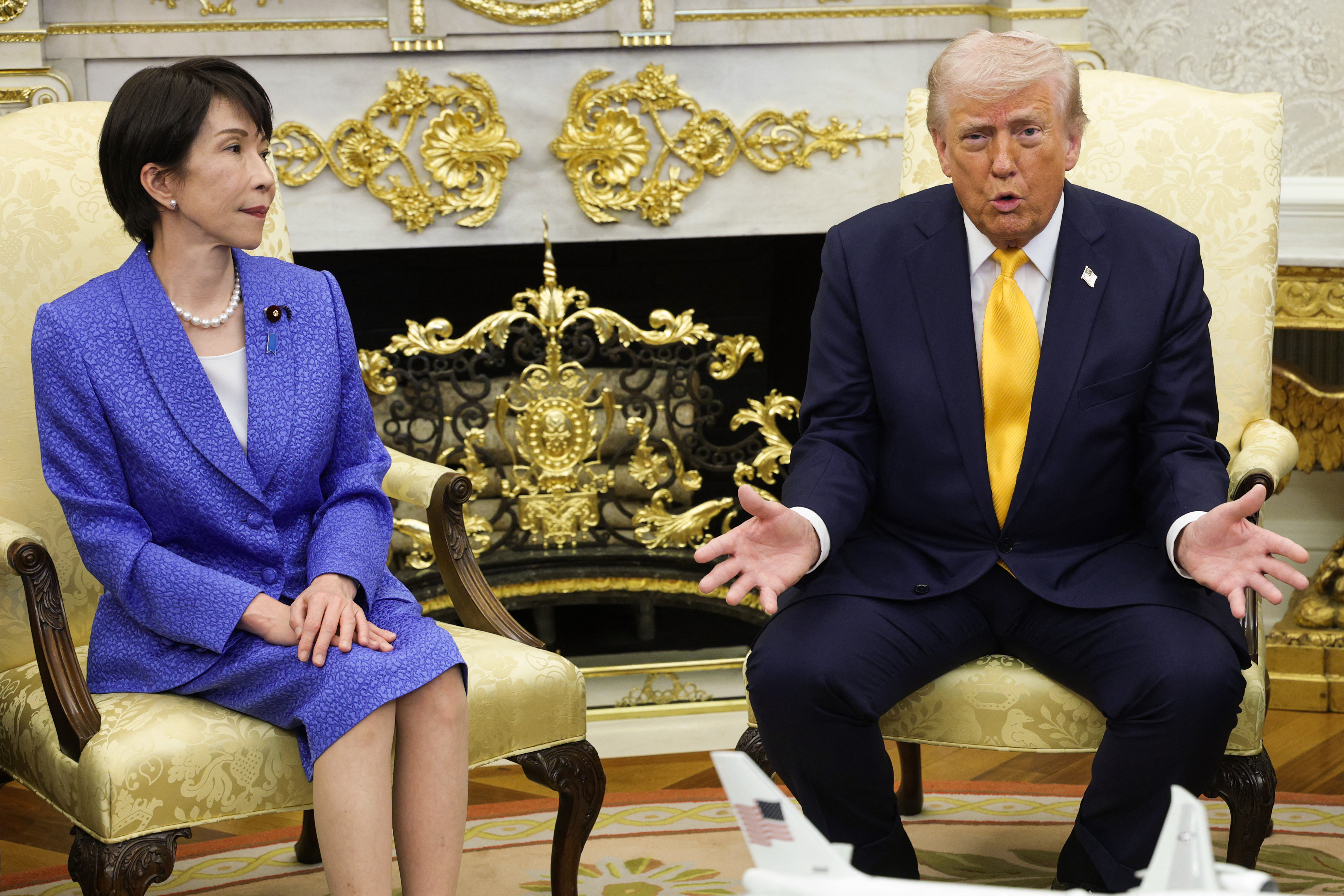 WASHINGTON, DC - MARCH 19: Prime Minister of Japan Sanae Takaichi (L) meets with U.S. President Donald Trump during a bilateral meeting in the Oval Office of the White House on March 19, 2026 in Washington, DC. The two leaders are expected to discuss topics including the current conflict in Iran and the threat that is posed by China. Alex Wong/Getty Images/AFP (Photo by ALEX WONG / GETTY IMAGES NORTH AMERICA / Getty Images via AFP)