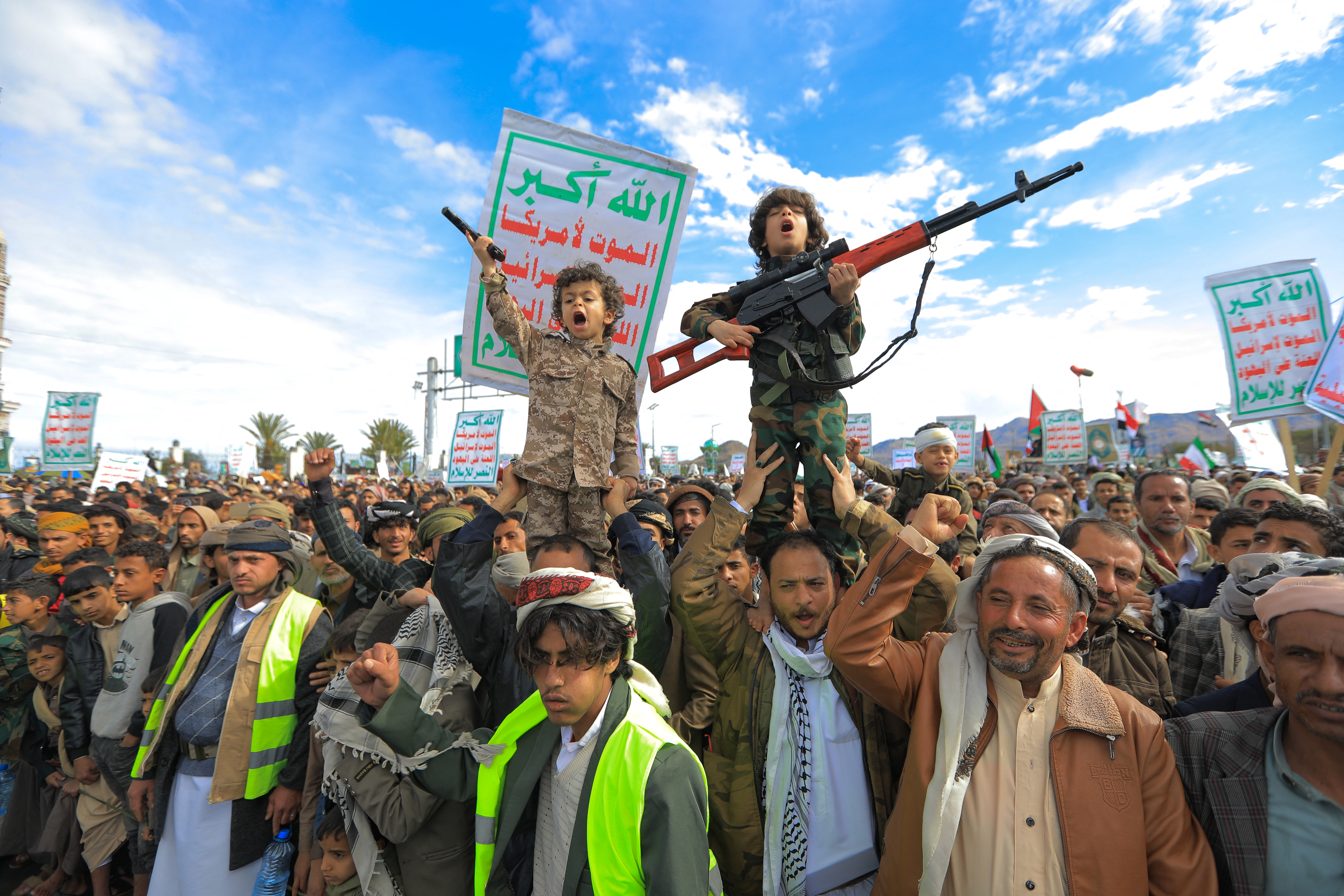 Young Houthi supporters hold weapons during a rally in solidarity with Iran and Lebanon, amid the US-Israeli war with Iran, in the Yemeni capital Sanaa on March 27, 2026.