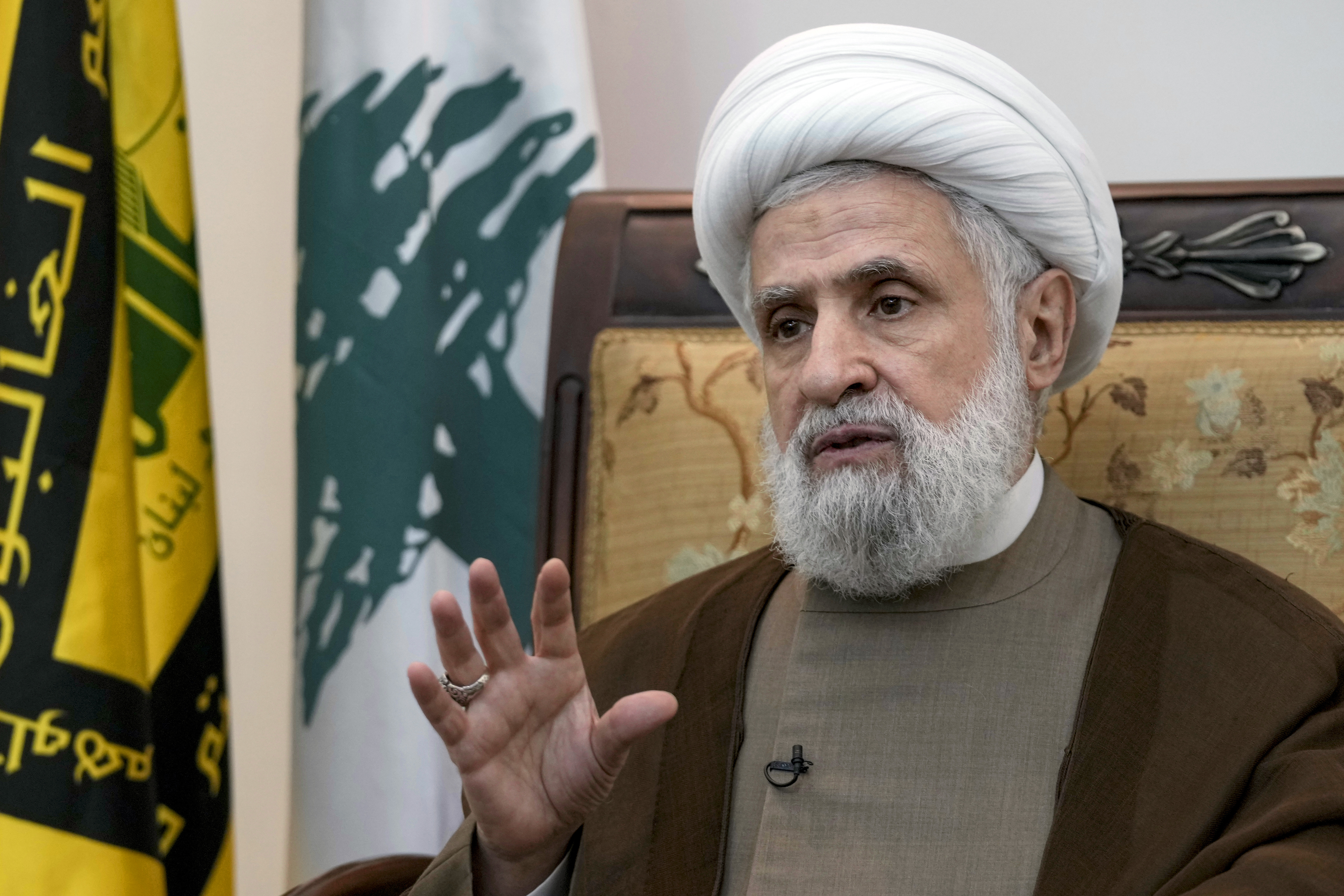 Hezbollah's deputy leader, Sheikh Naim Kassem, speaks during an interview with The Associated Press in Beirut's southern suburbs, Tuesday, July 2, 2024. (AP Photo/Bilal Hussein)