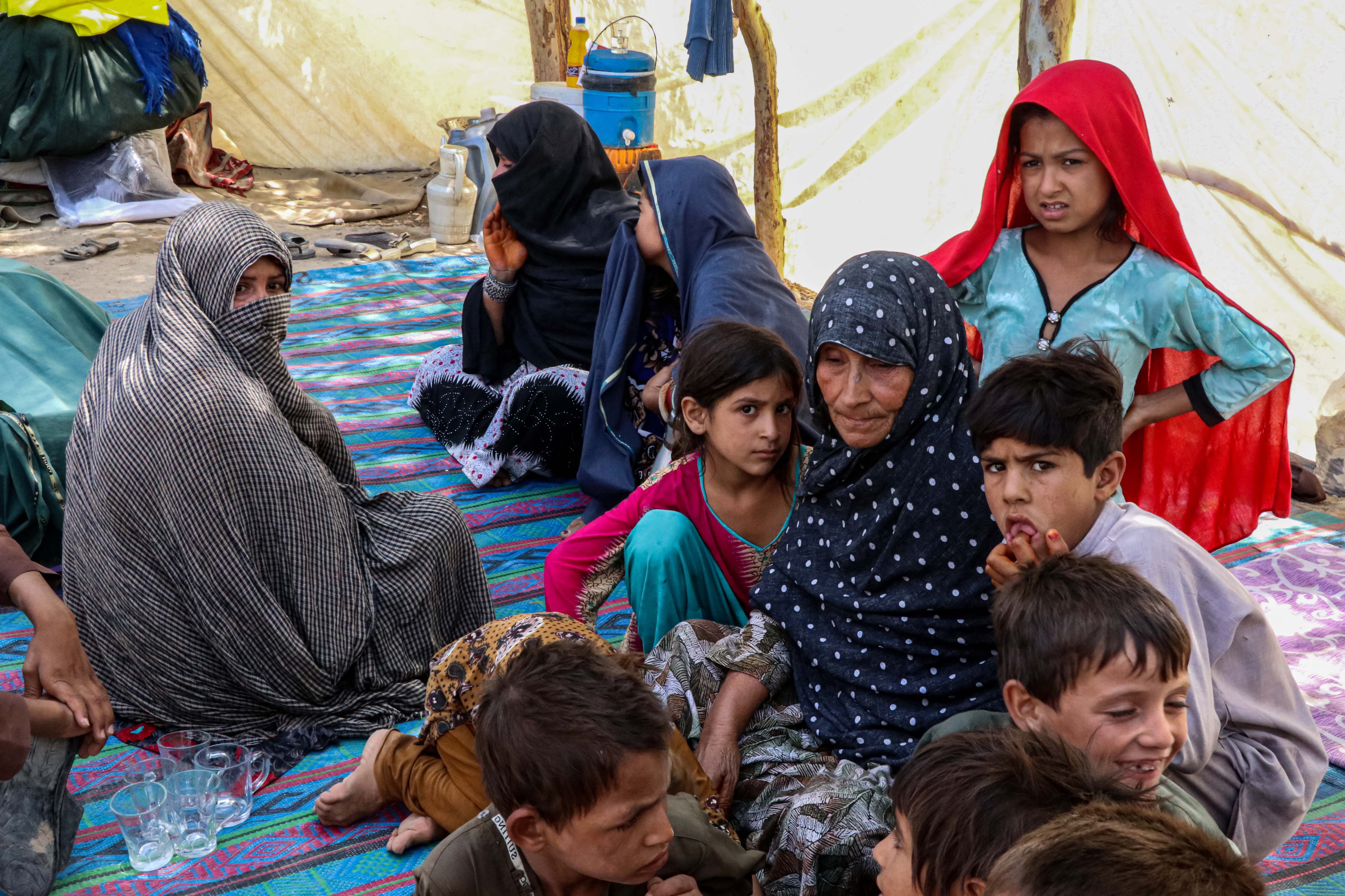 epa12794633 People displaced from the border region after conflicts with Pakistan live in temporary shelters in the Momand Dara district of Nangarhar province, Afghanistan, 04 March 2026. The deputy spokesman for the Islamic Emirate, Mullah Hamdullah Fitrat said that 110 civilians were killed and 123 injured in, what he described as attacks by the Pakistani military in Afghanistan. He added that about 8,400 families have been displaced and that financial losses have been reported among the general population. EPA/STRINGER