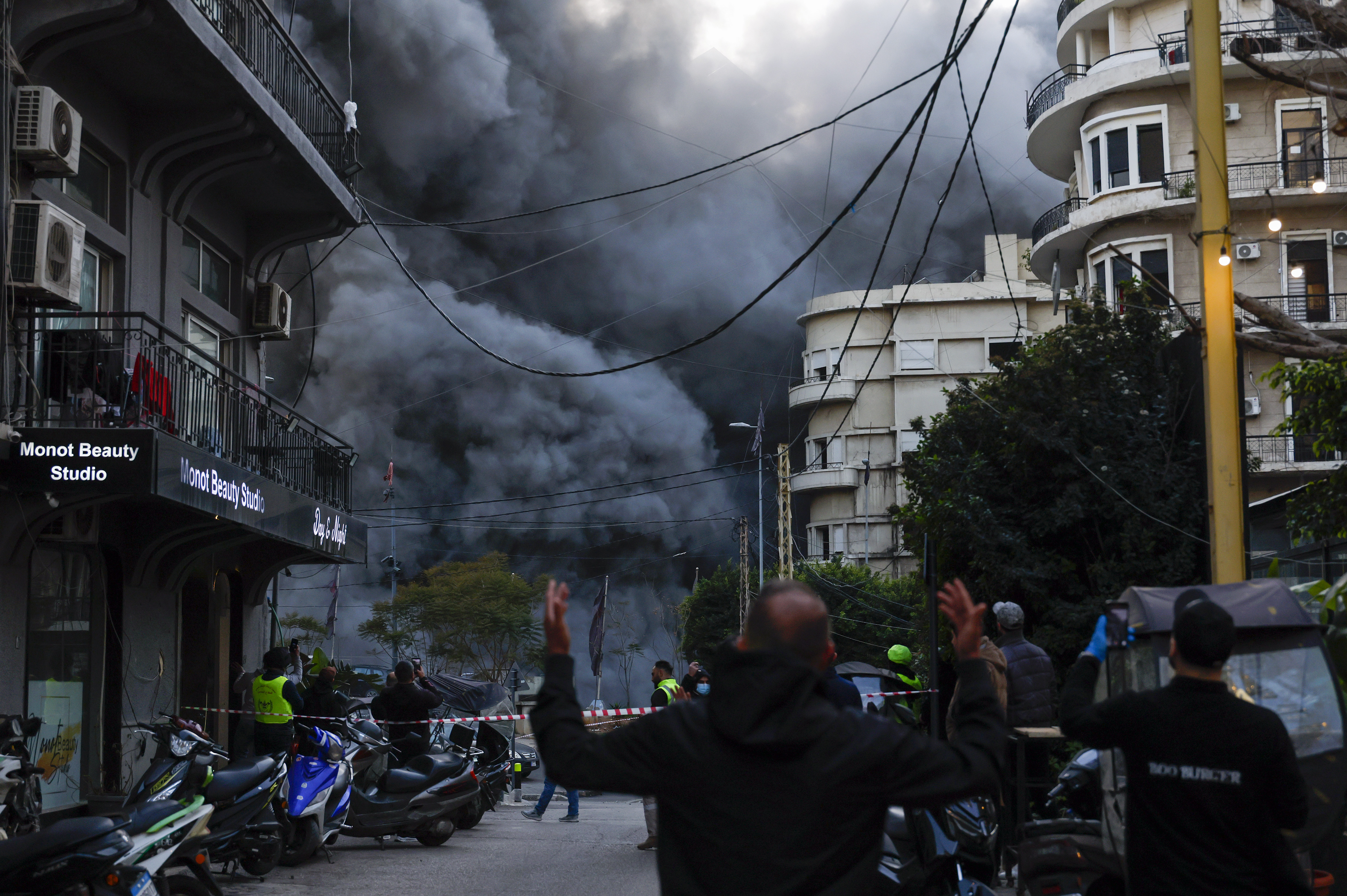 Smoke rises following an air strike on a building.