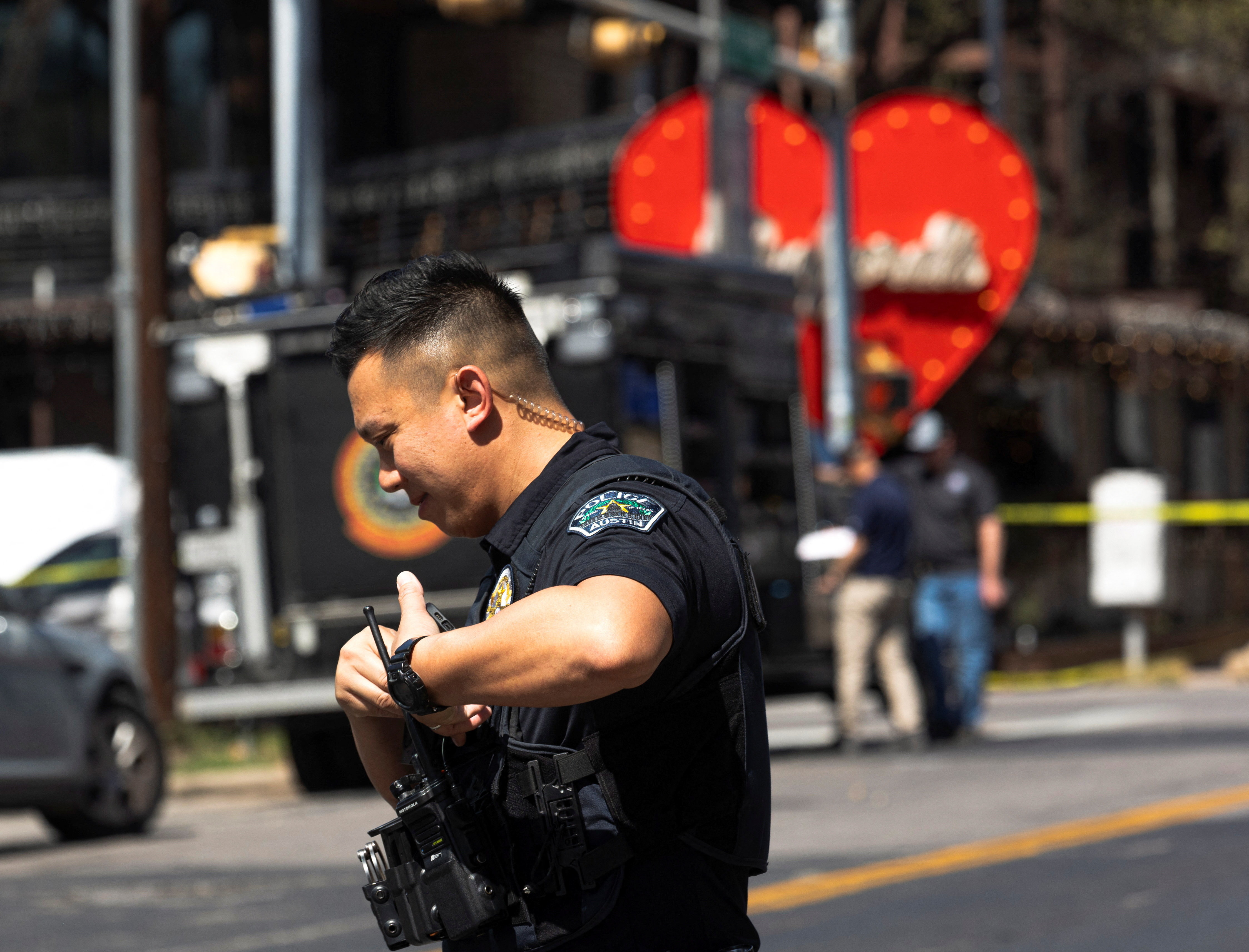A police officer works at the scene after a deadly mass shooting outside Buford's, a popular roadhouse-style bar in Austin, Texas, U.S. March 1, 2026. REUTERS/Nuri Vallbona