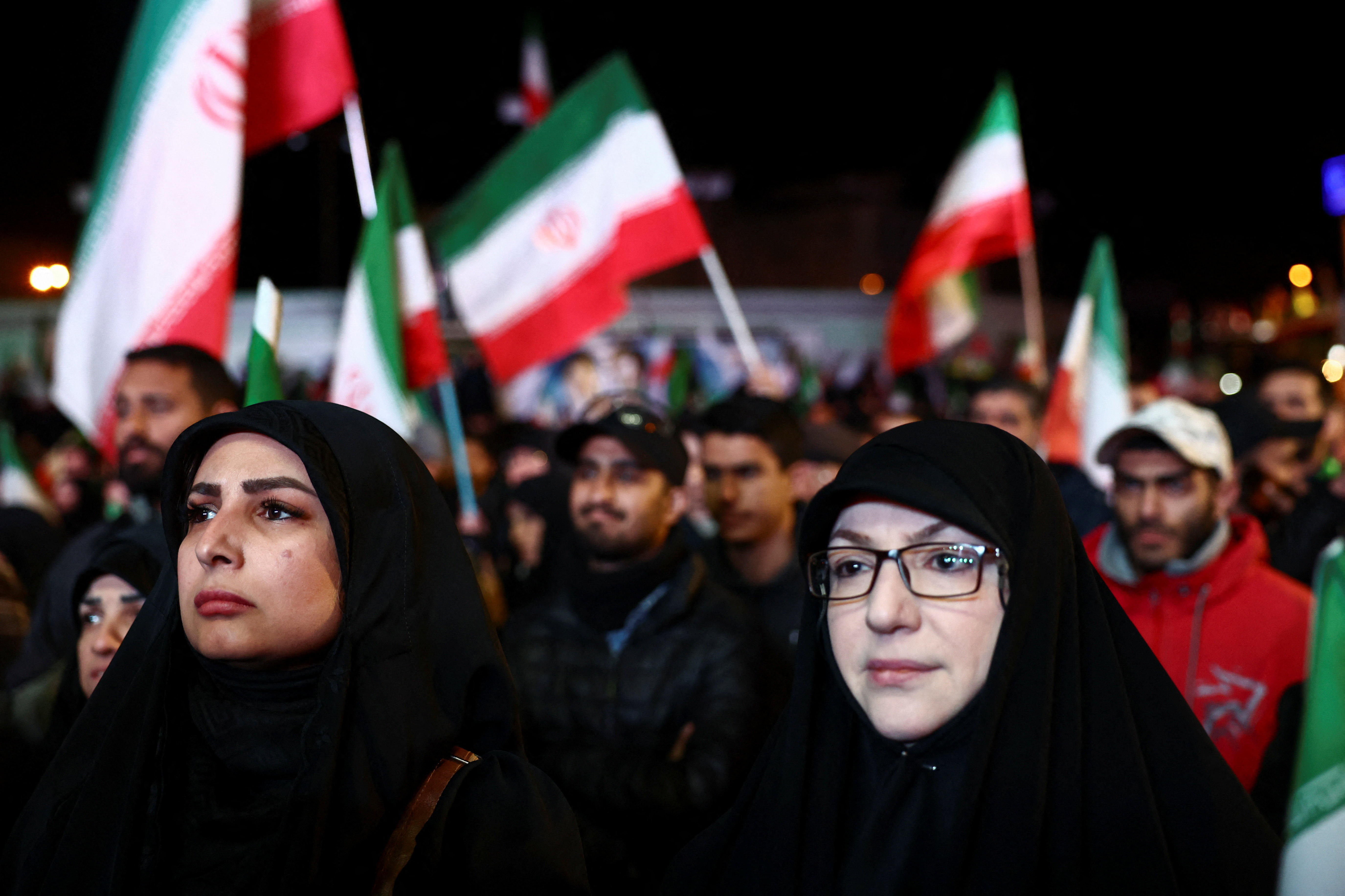 People gather after a two-week ceasefire in the Iran war was announced,