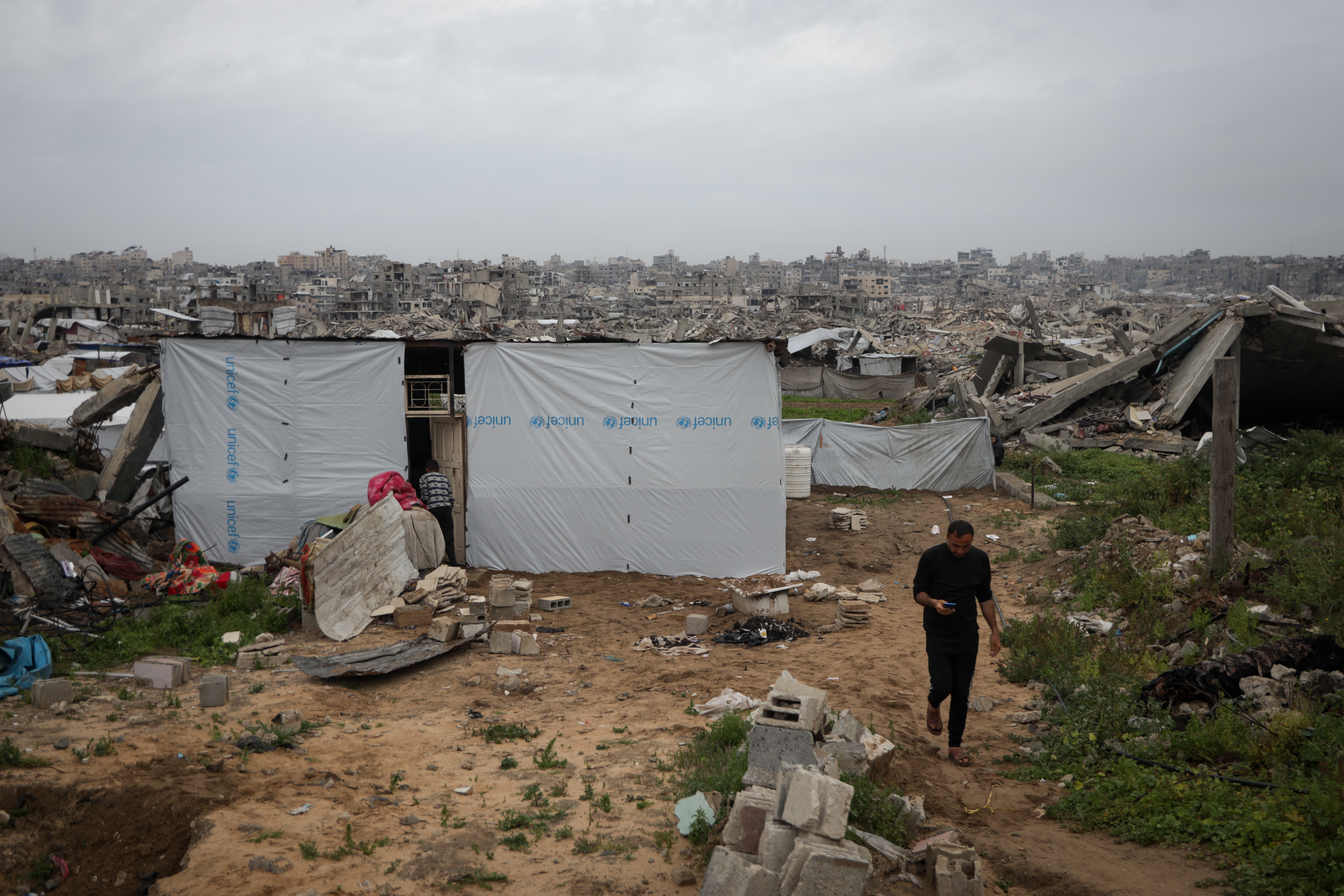A building with tarp around it