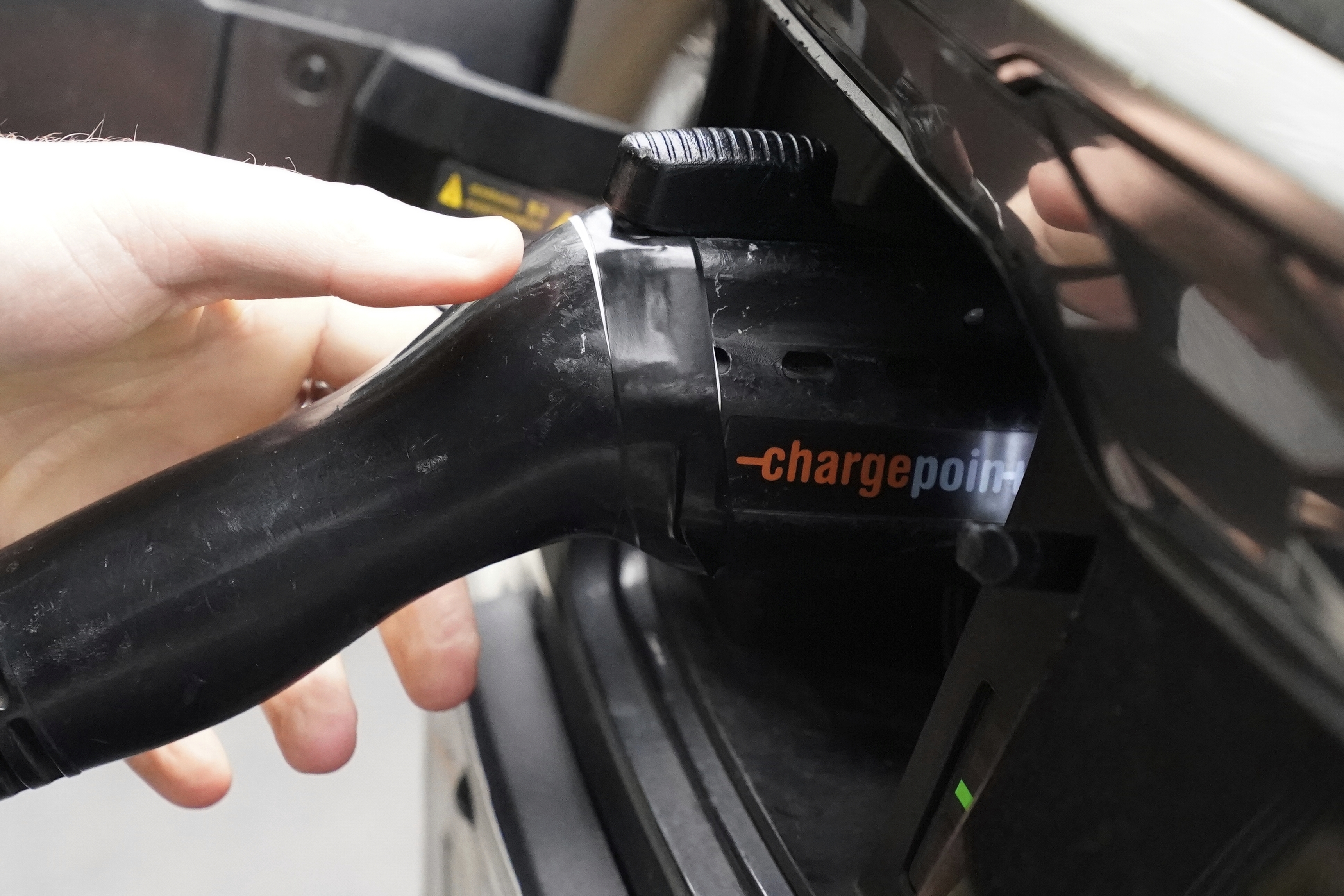 A Kia Niro electric vehicle charges in Newport, Rhode Island, on April 19, 2025