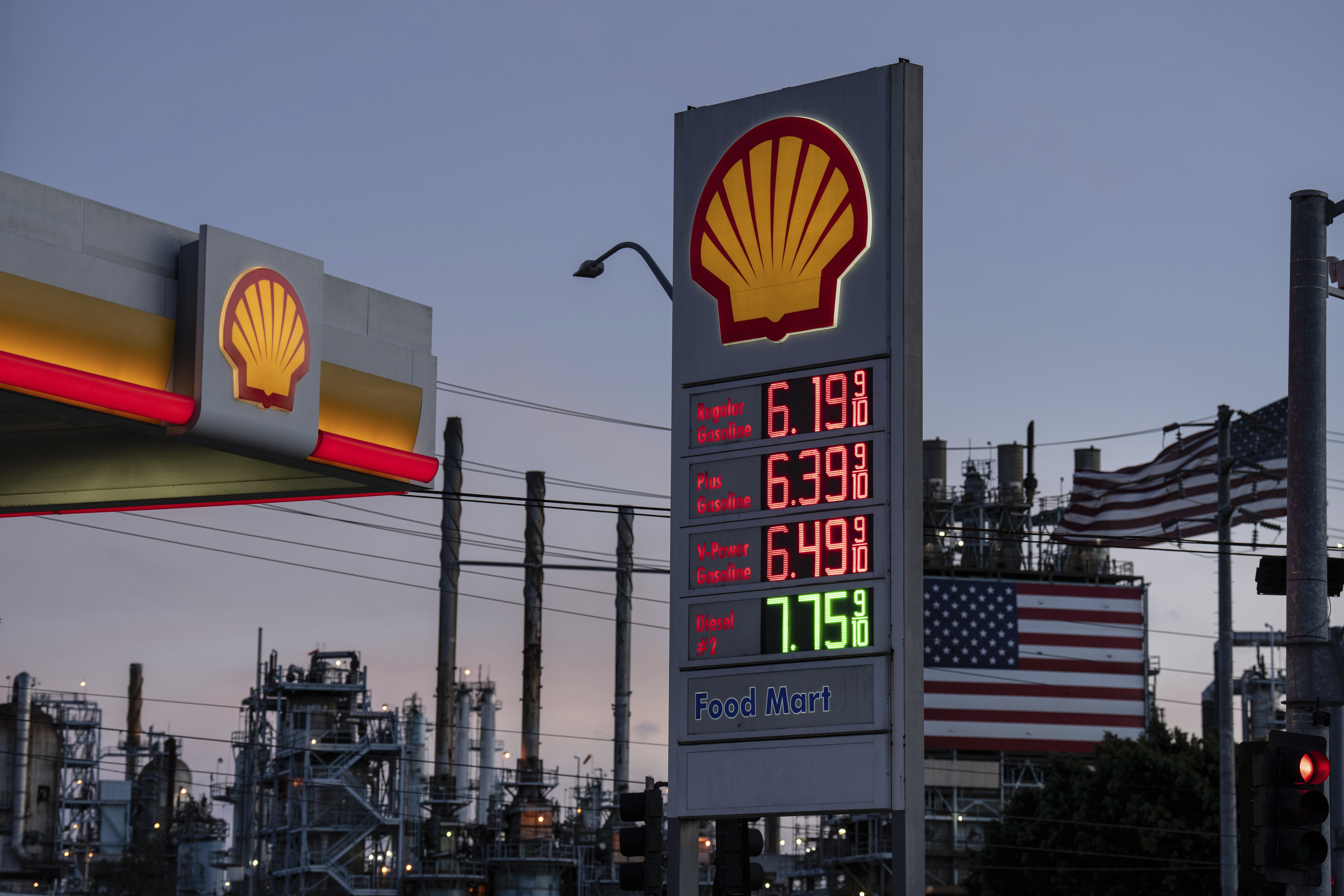 Gas prices are displayed at a Shell gas station in front of the Marathon Petroleum refinery in Carson, Calif., Wednesday, April 1, 2026. (AP Photo/Jae C. Hong)