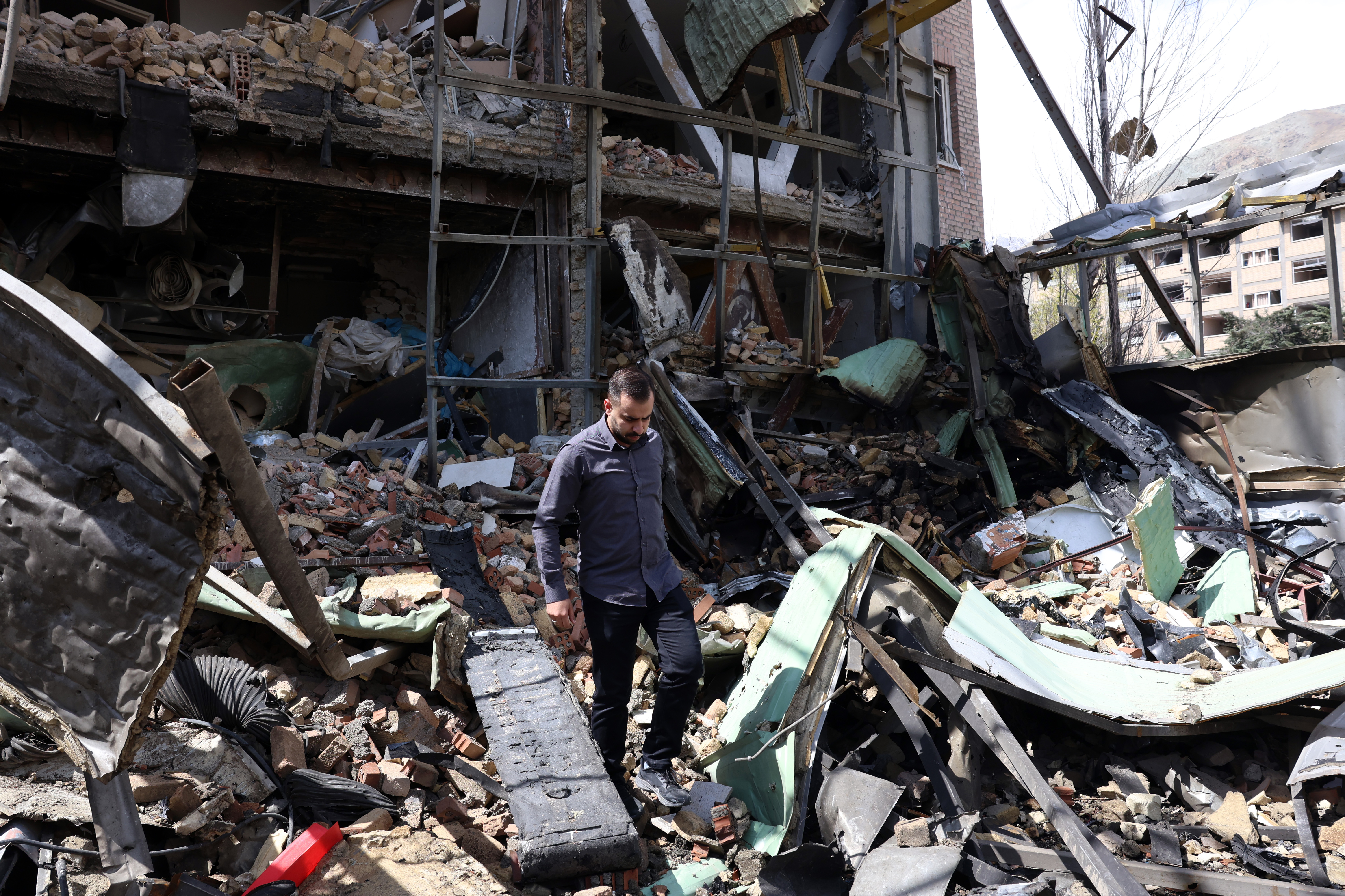 epa12868654 Iranian officials inspect the damage after US-Israeli airstrikes on the Shahid Beheshti University, in Tehran, Iran, 04 April 2026. A joint Israeli and US military operation, launched on 28 February, continues to target multiple locations across Iran. EPA/ABEDIN TAHERKENAREH