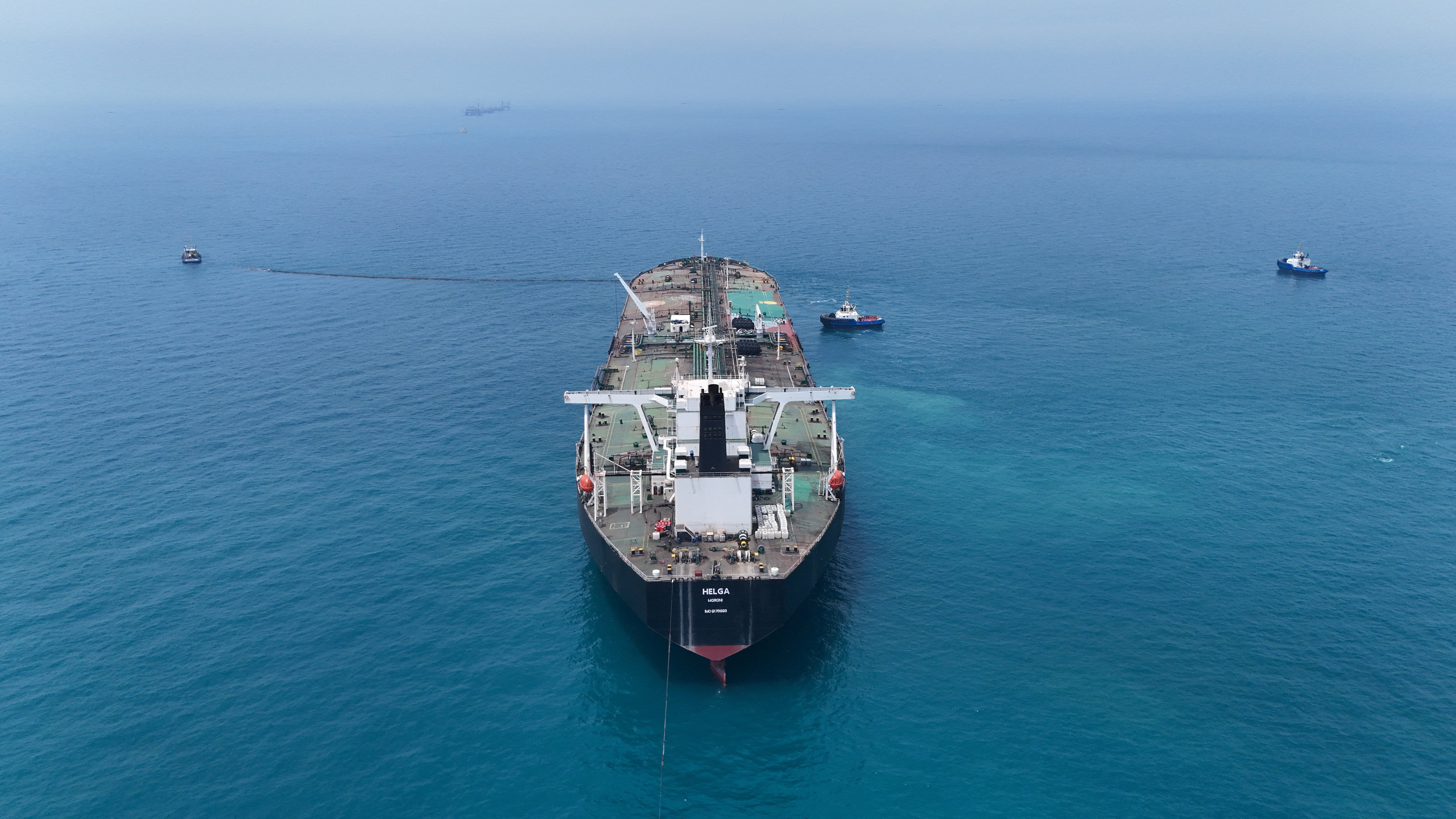 Drone view of oil tanker HELGA berthed at one of Iraq's southern offshore oil terminals near Basra as it prepares to load crude oil, becoming the second vessel to arrive since the closure of the Strait of Hormuz, April 24, 2026. REUTERS/Mohammed Aty