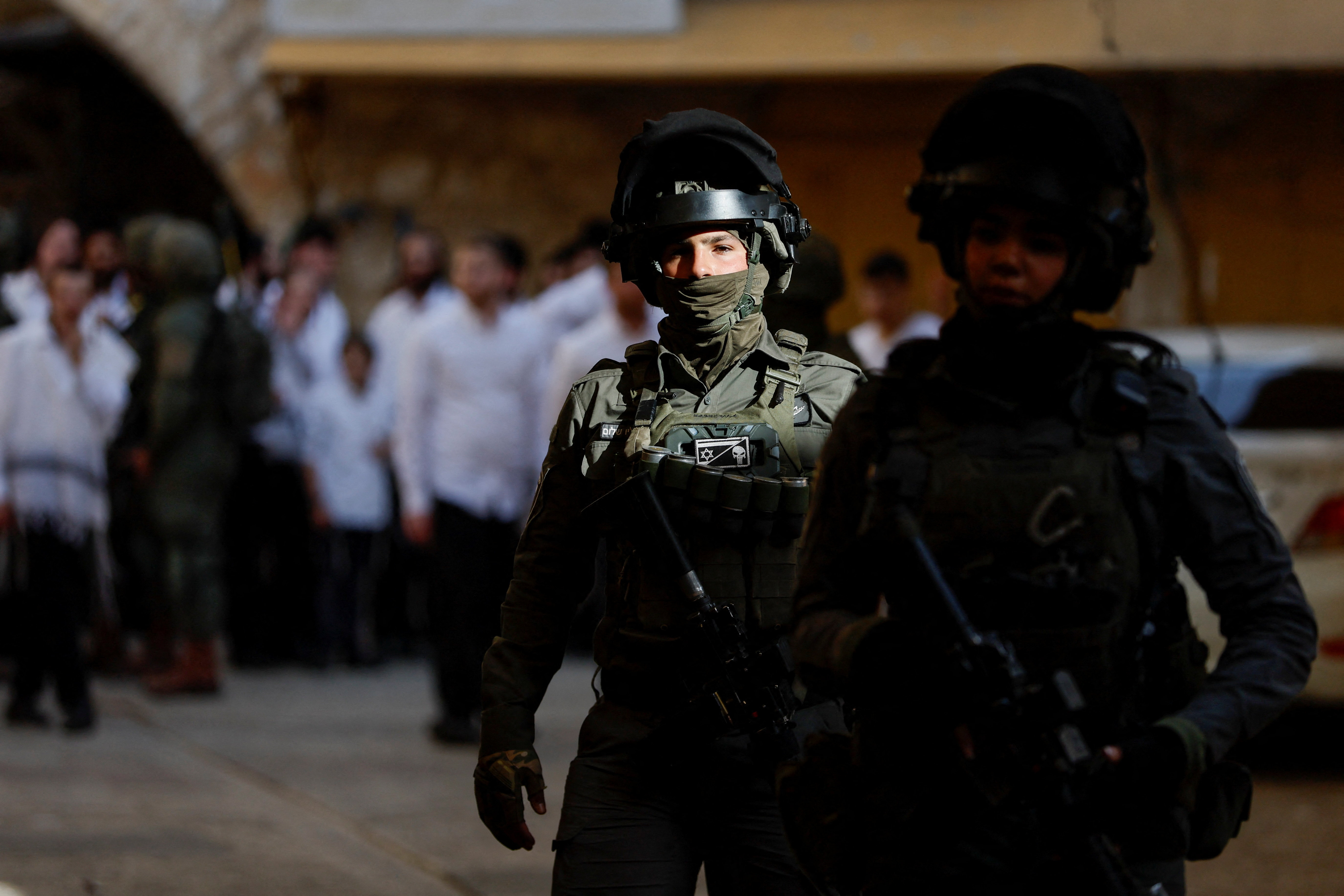 Israeli soldiers patrol during a weekly settlers' tour in Hebron, in the Israeli-occupied West Bank, May 9, 2026. REUTERS/Mussa Qawasma