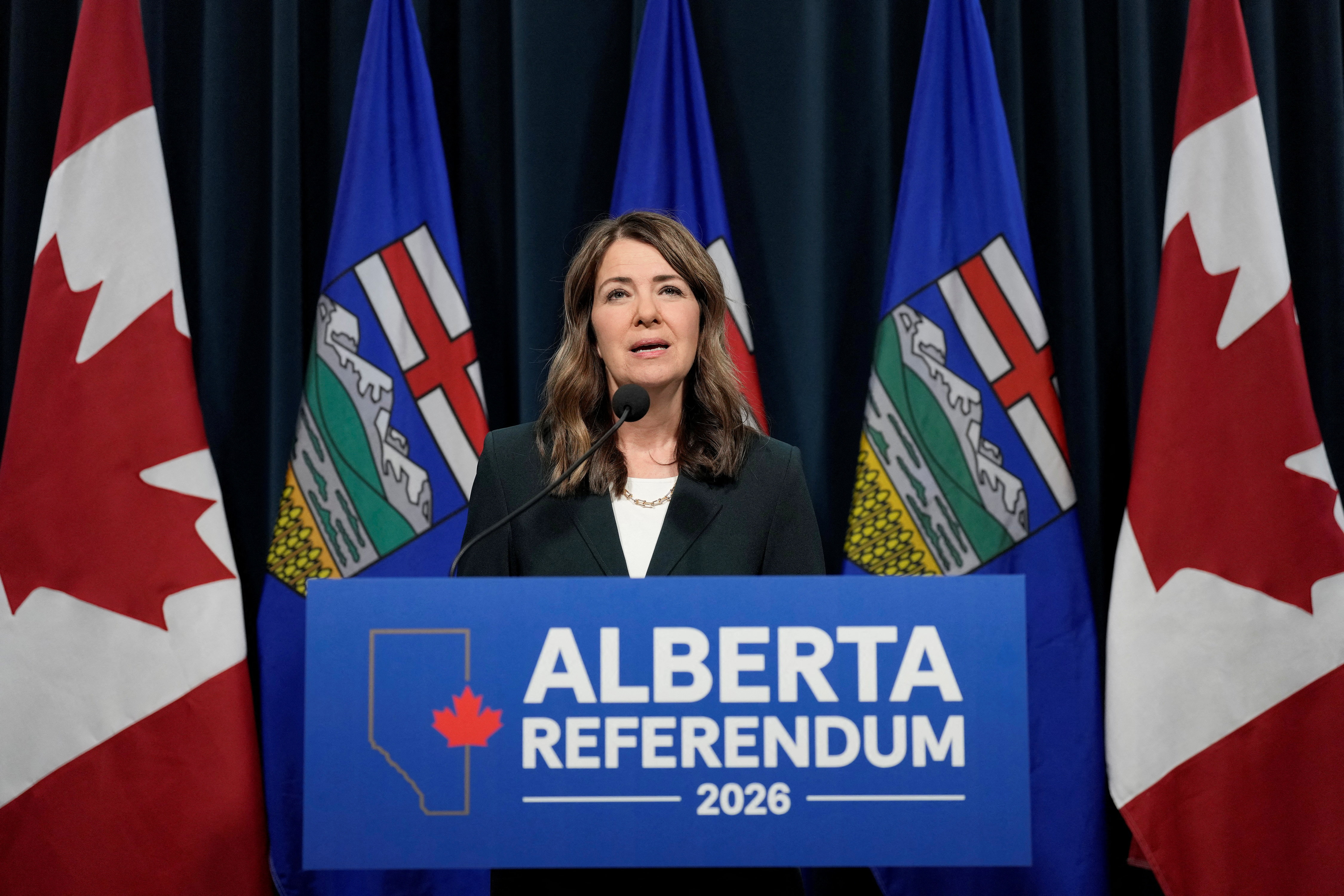 Alberta Premier Danielle Smith answers questions at a news conference in Calgary, Alberta, Canada May 22, 2026. [Todd Korol/Reuters]